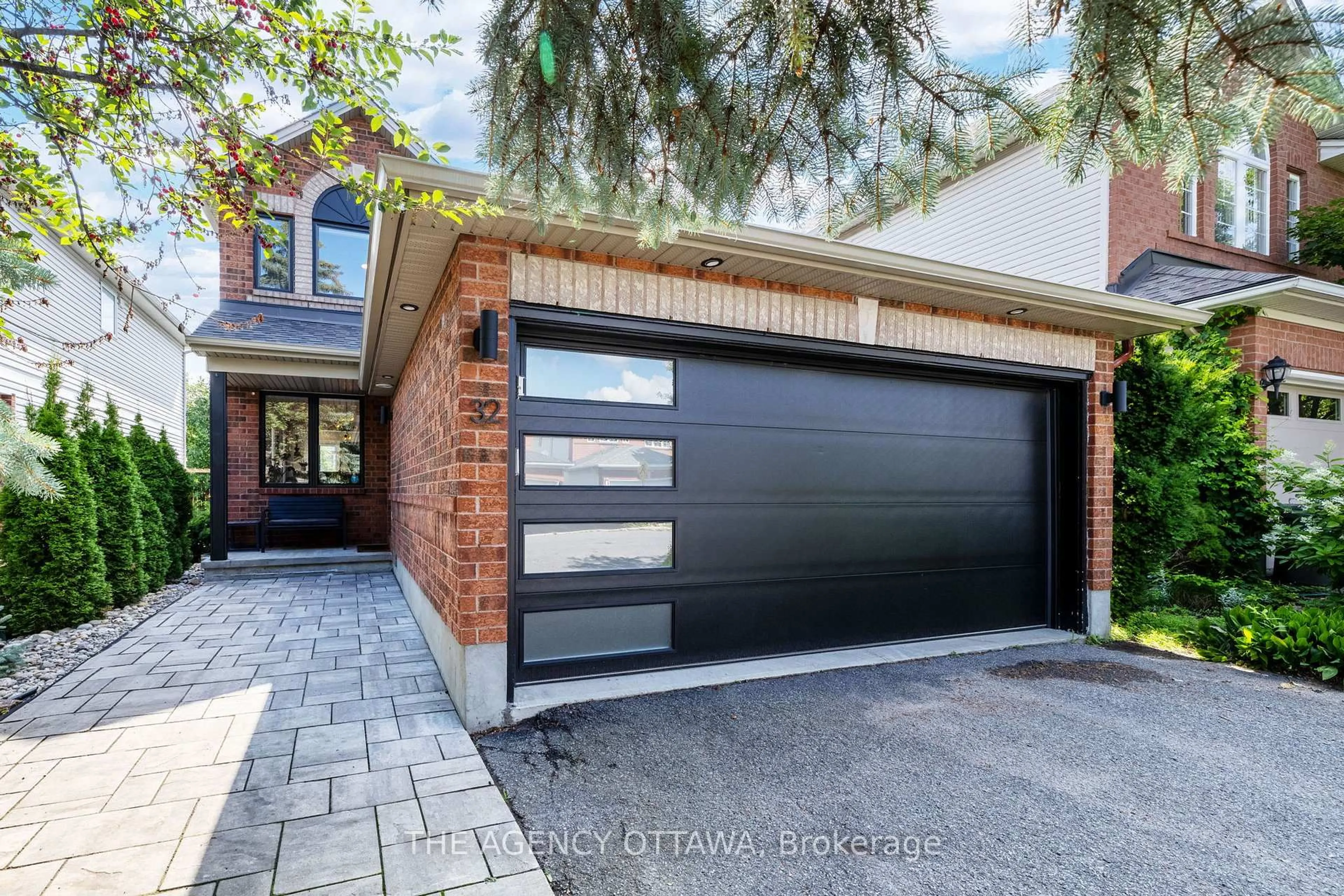 Home with brick exterior material, street for 32 WHITESTONE Dr, Ottawa Ontario K2C 4A9