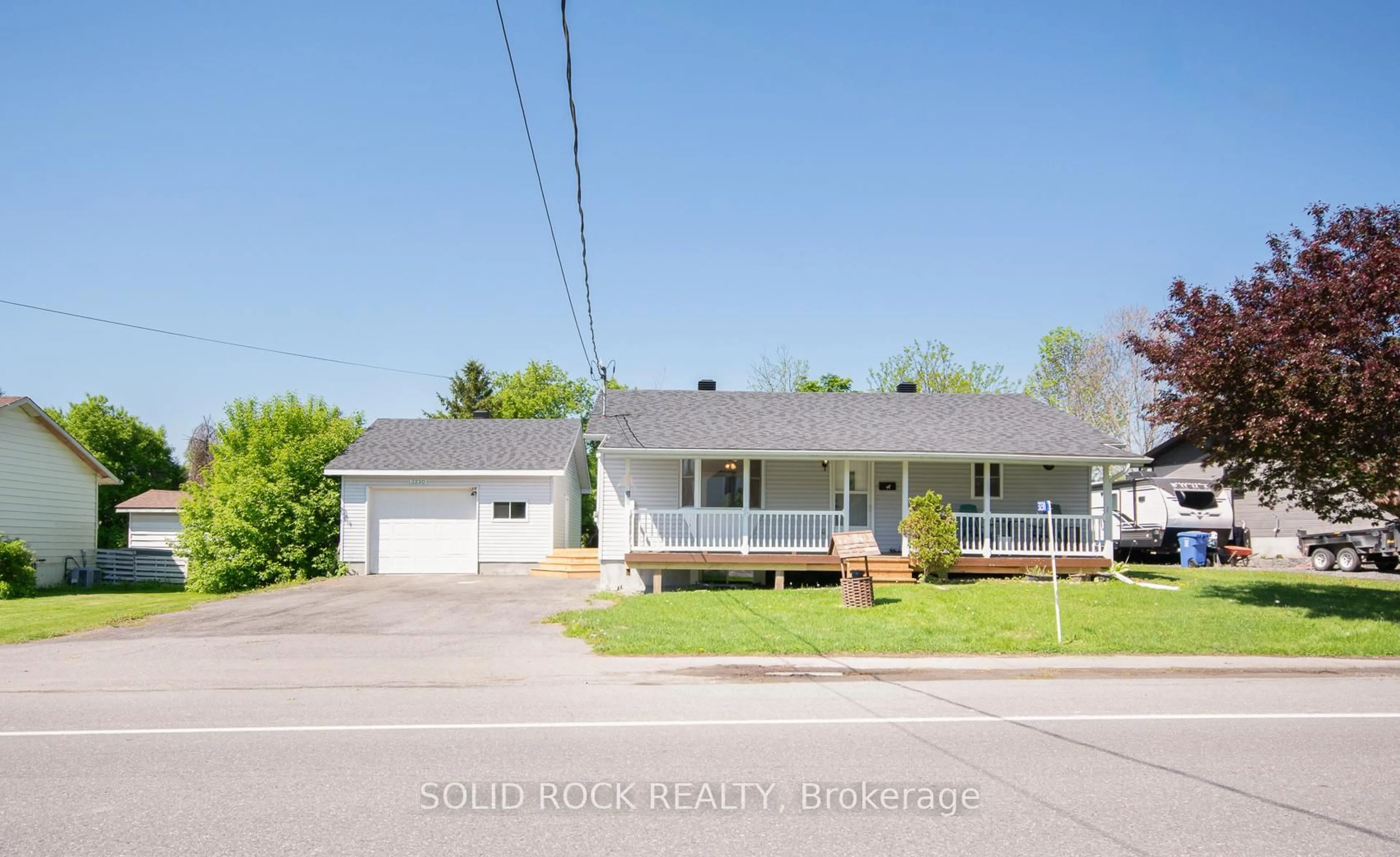 Home with vinyl exterior material, street for 3230 Yorks Corners Rd, Kenmore Ontario K0A 2G0