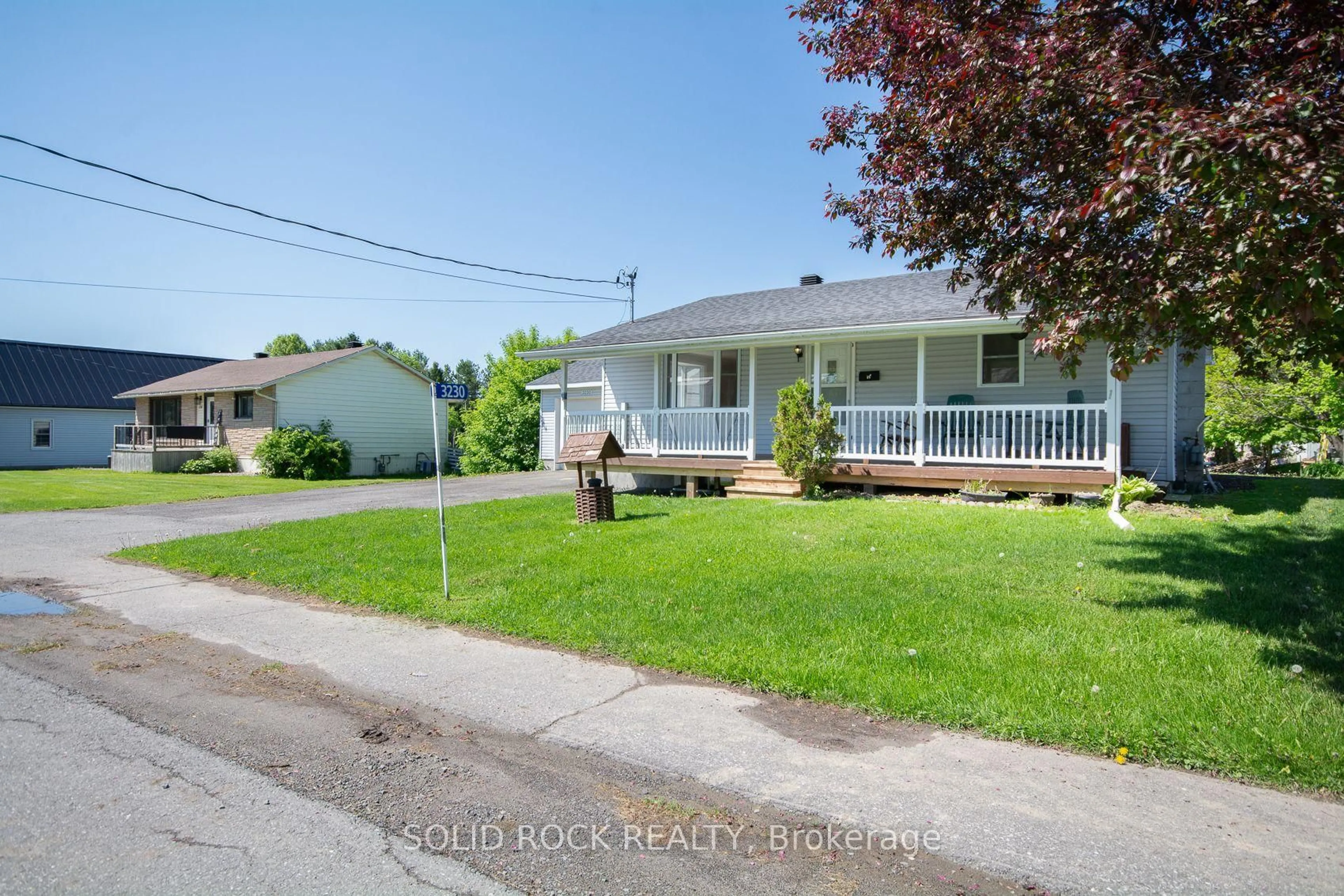 A pic from outside/outdoor area/front of a property/back of a property/a pic from drone, street for 3230 Yorks Corners Rd, Kenmore Ontario K0A 2G0