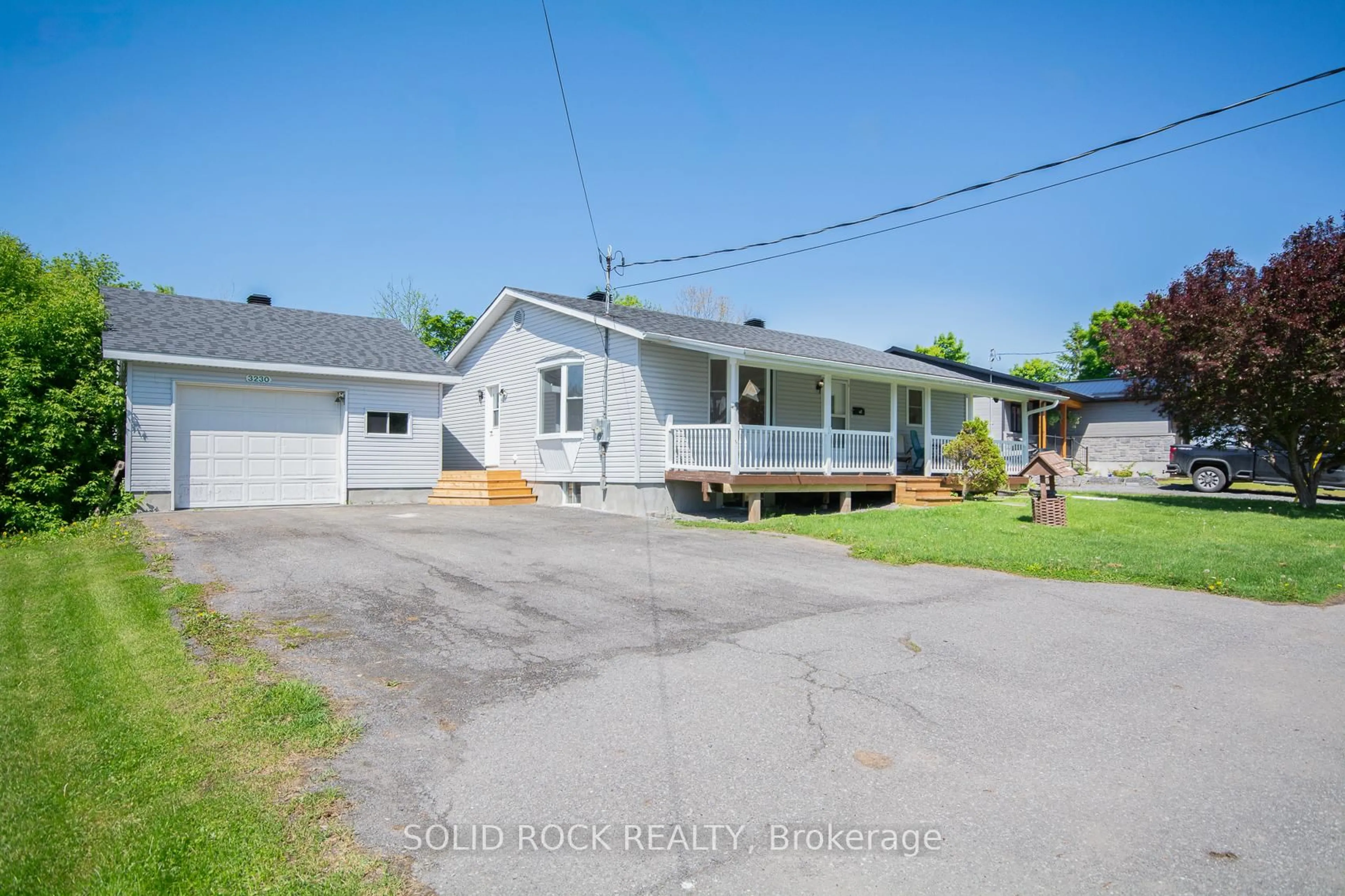 A pic from outside/outdoor area/front of a property/back of a property/a pic from drone, street for 3230 Yorks Corners Rd, Kenmore Ontario K0A 2G0