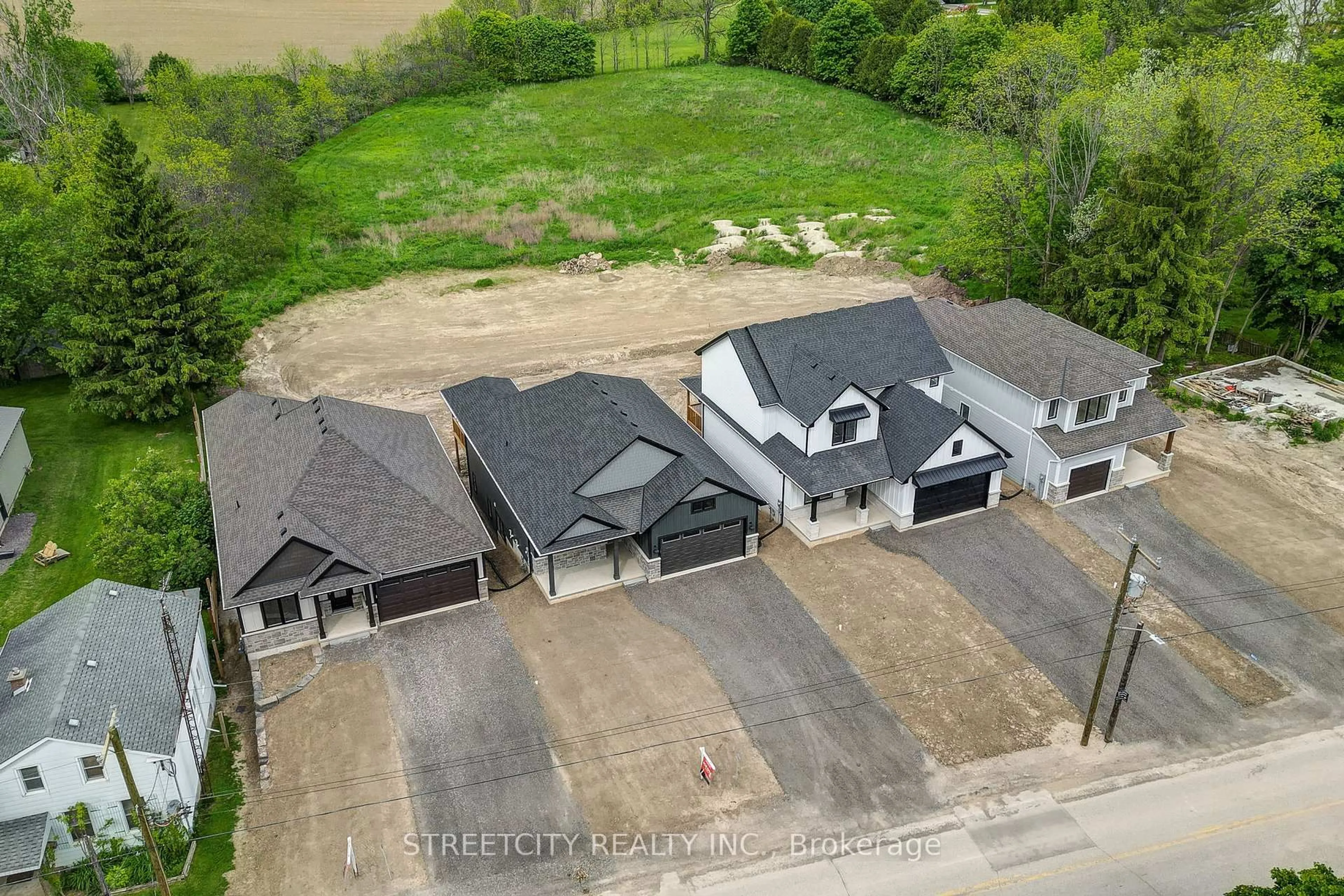 A pic from outside/outdoor area/front of a property/back of a property/a pic from drone, street for 8074 Union Rd, Southwold Ontario N0L 1K0