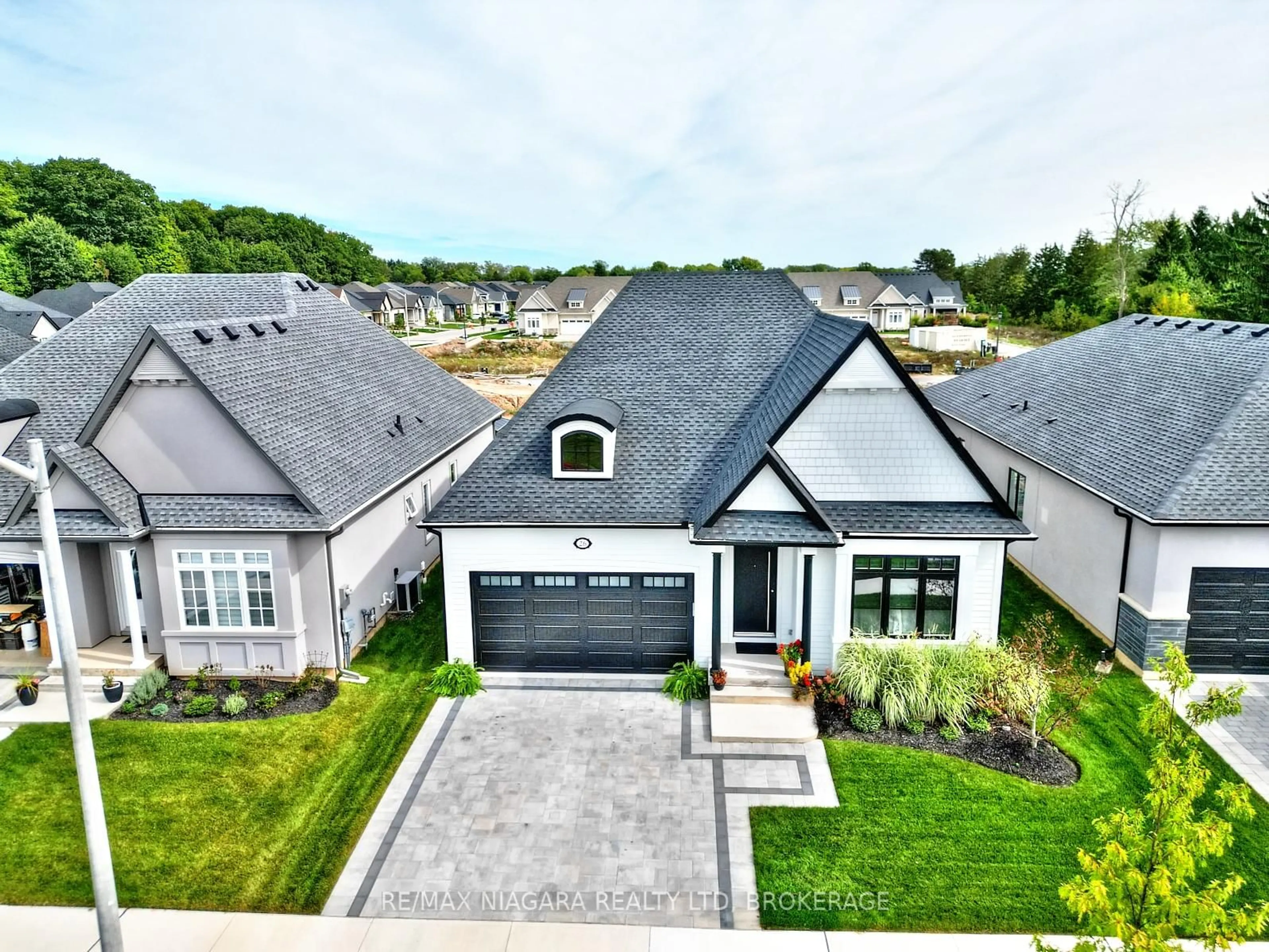 A pic from outside/outdoor area/front of a property/back of a property/a pic from drone, street for 26 Sunrise Crt, Fort Erie Ontario L0S 1N0