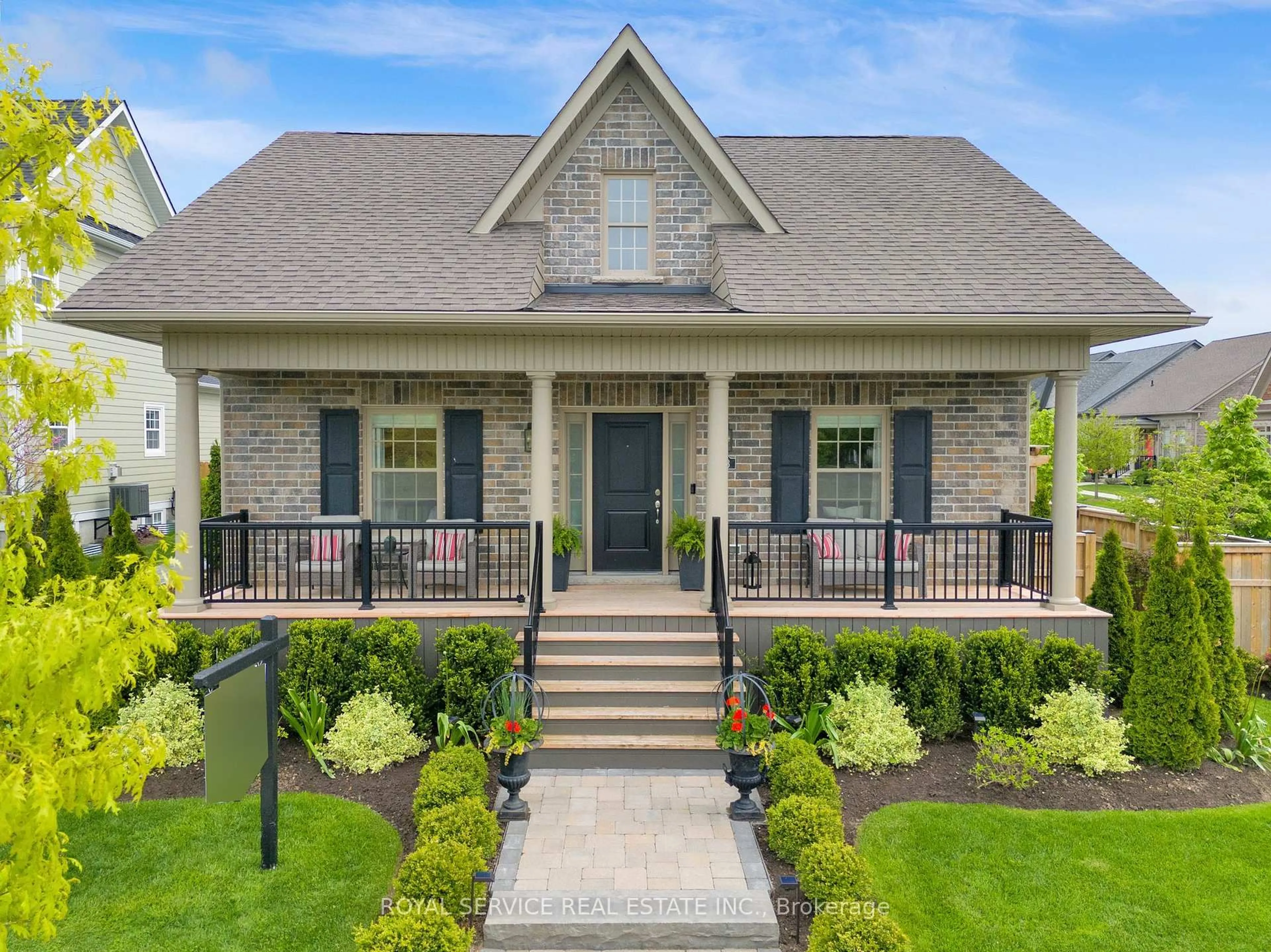 Home with vinyl exterior material, street for 923 Charles Wilson Pkwy, Cobourg Ontario K9A 0L2