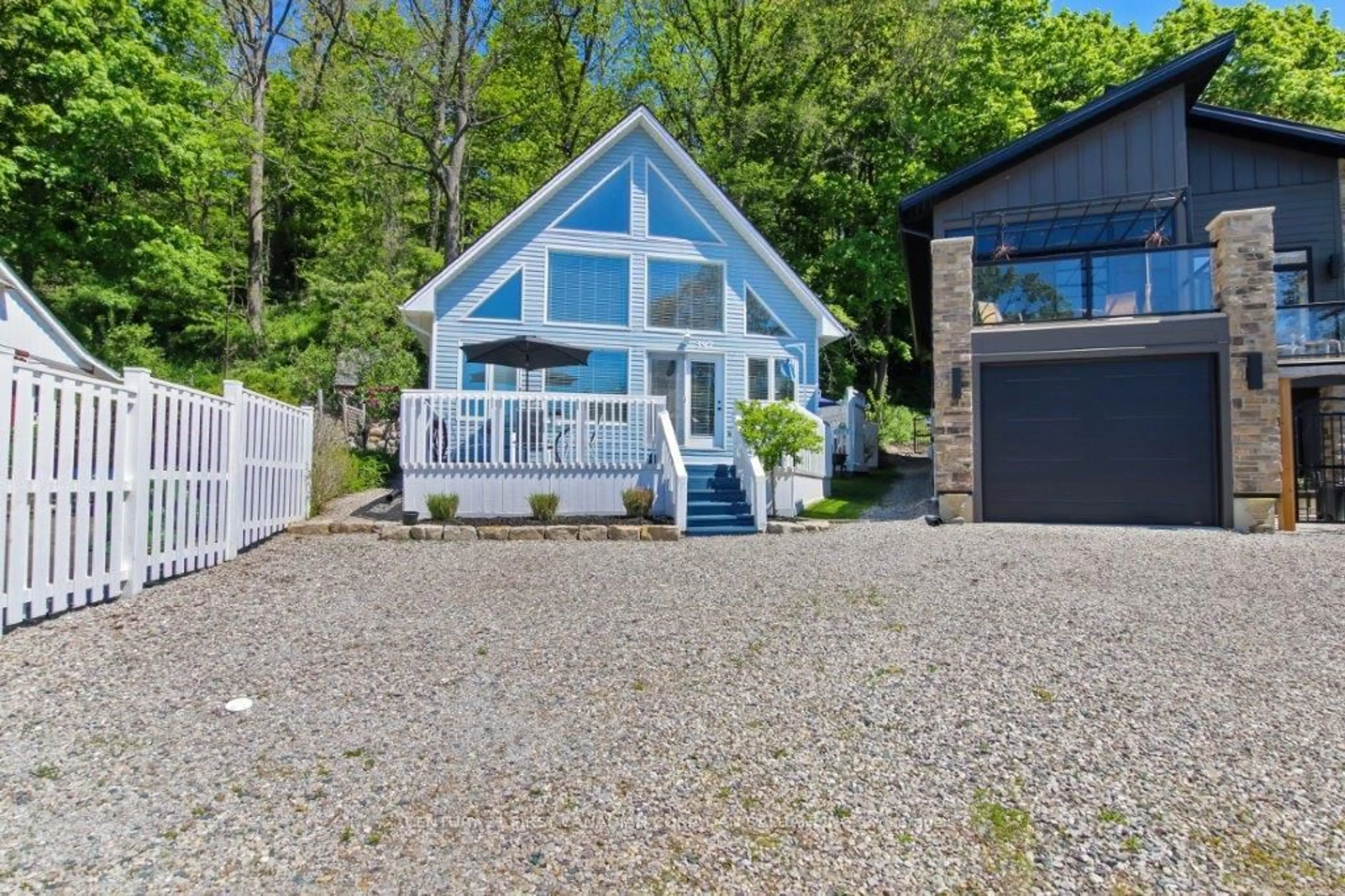 A pic from outside/outdoor area/front of a property/back of a property/a pic from drone, water/lake/river/ocean view for 397 Stanley Park Dr, Central Elgin Ontario N5L 1E6