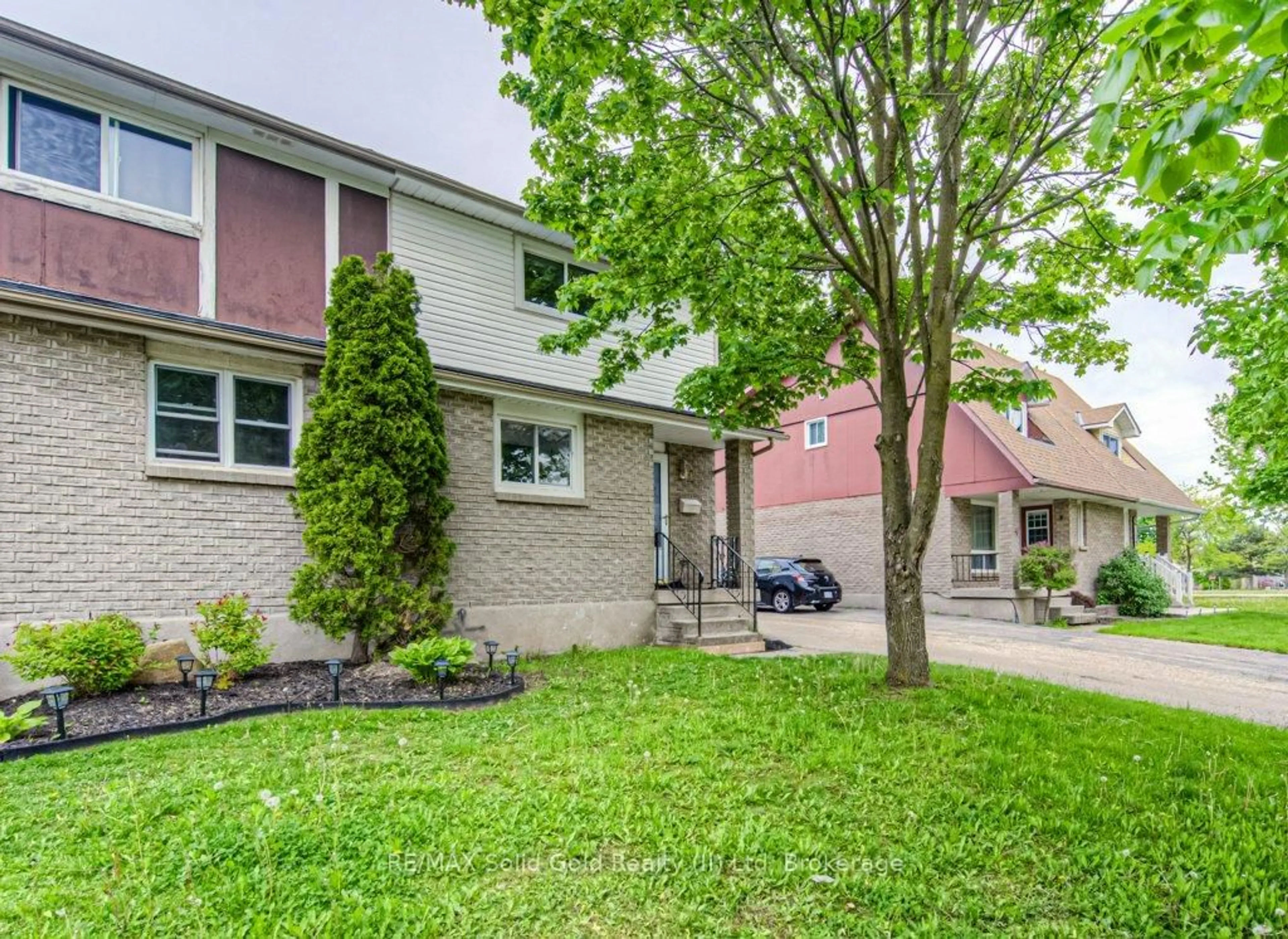 Home with brick exterior material, street for 48 Timberlane Cres, Kitchener Ontario N2N 1S9
