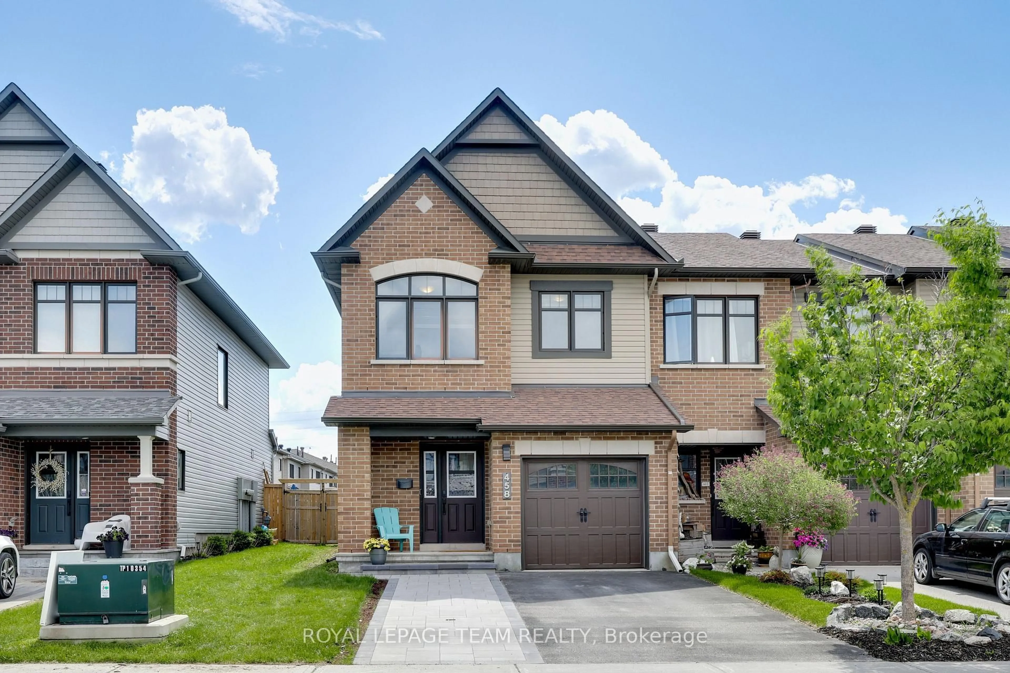 Home with brick exterior material, street for 458 BRETTONWOOD Rdge, Ottawa Ontario K2T 0K7