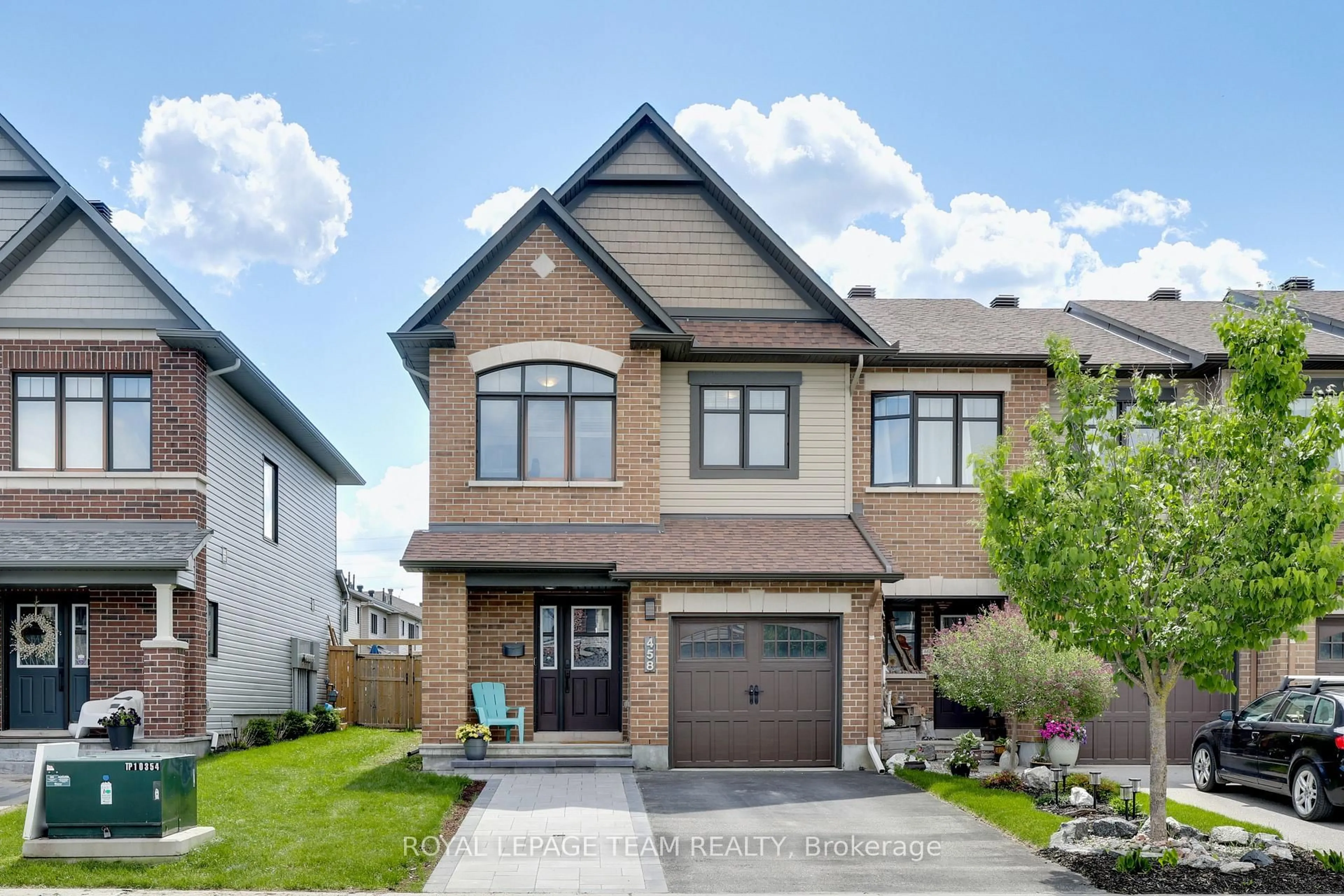 Home with brick exterior material, street for 458 BRETTONWOOD Rdge, Ottawa Ontario K2T 0K7
