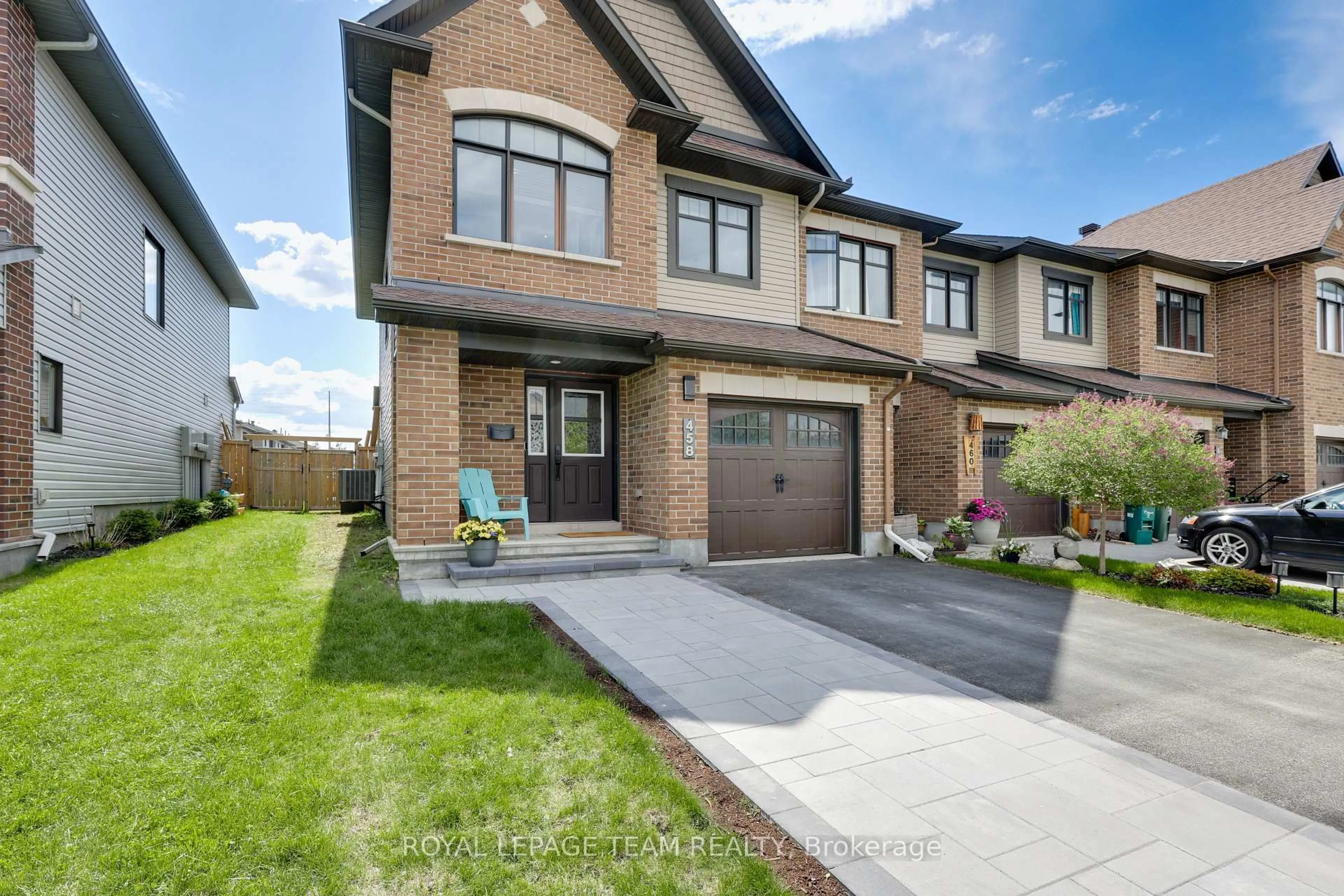 Home with brick exterior material, street for 458 BRETTONWOOD Rdge, Ottawa Ontario K2T 0K7