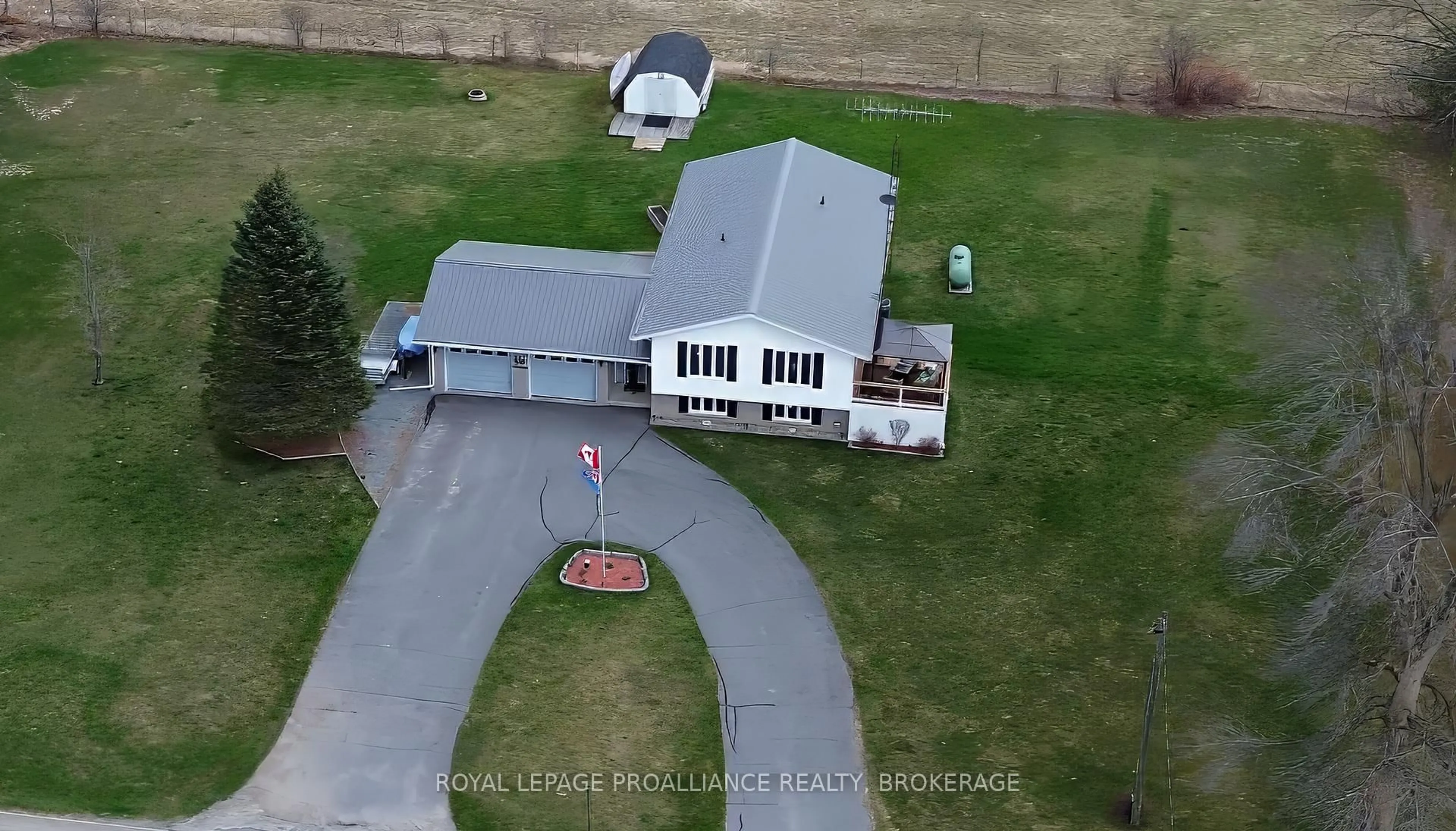 A pic from outside/outdoor area/front of a property/back of a property/a pic from drone, unknown for 4696 Watson Rd, Harrowsmith Ontario K0H 1V0