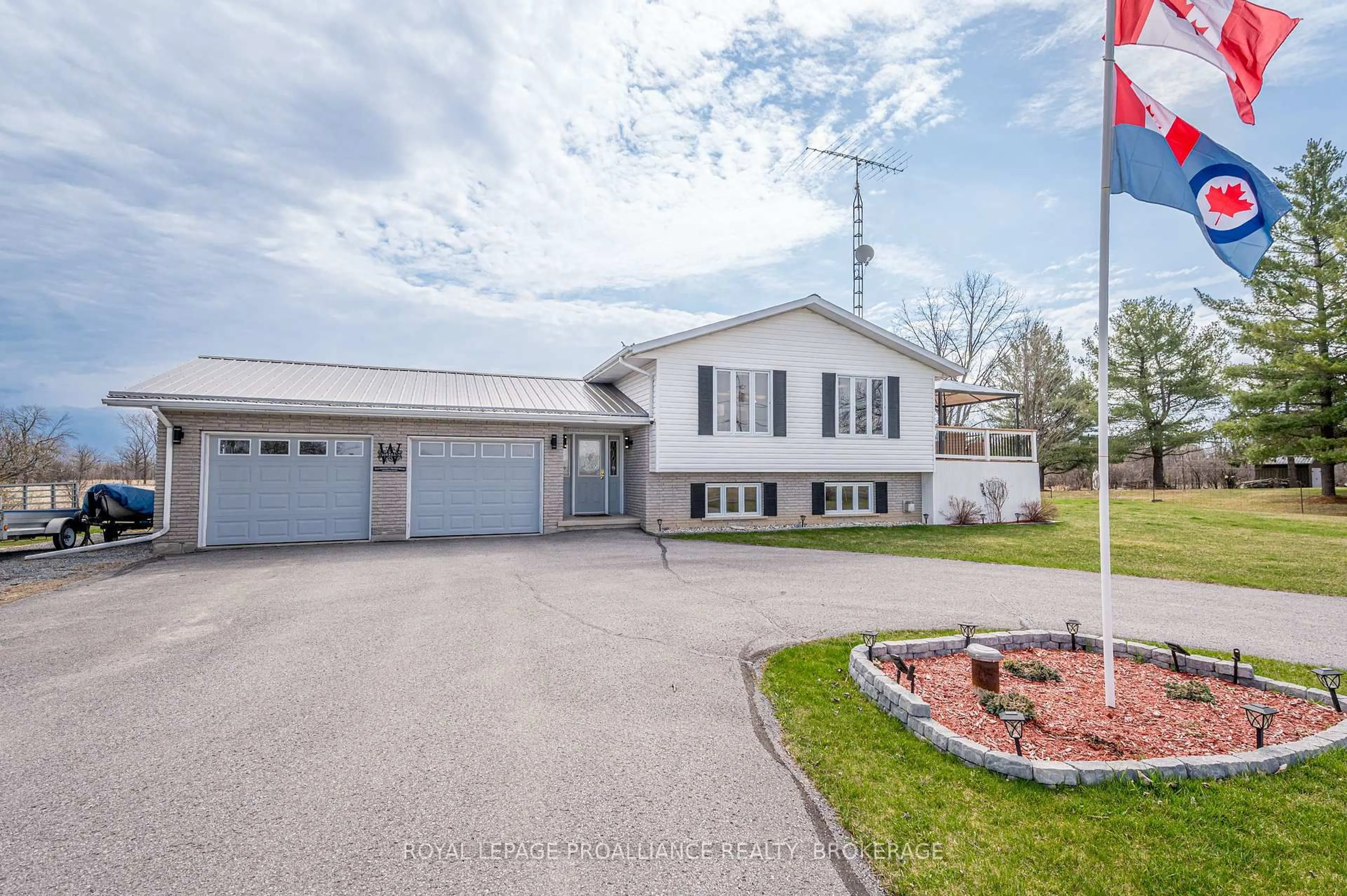 A pic from outside/outdoor area/front of a property/back of a property/a pic from drone, street for 4696 Watson Rd, Harrowsmith Ontario K0H 1V0