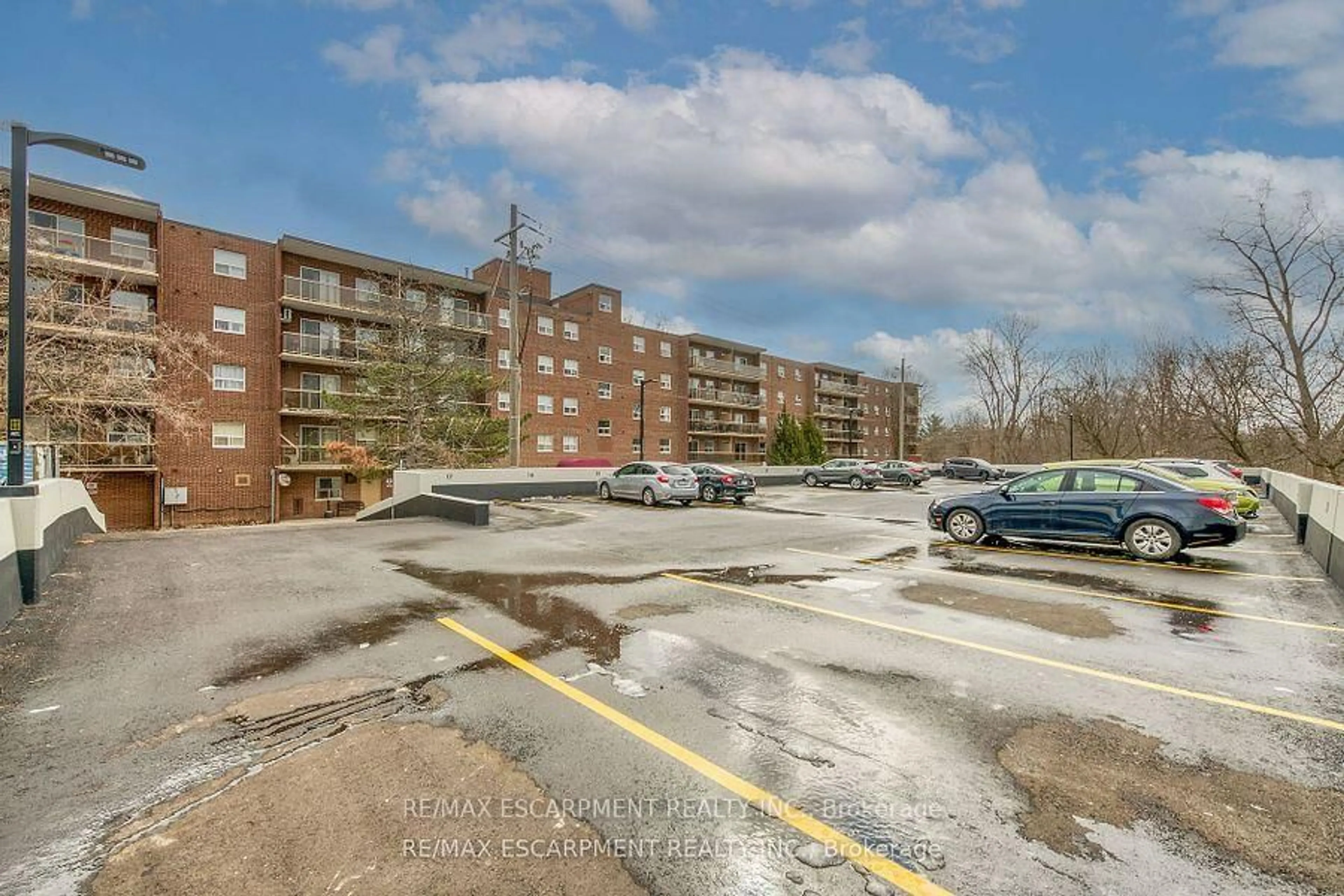 A pic from outside/outdoor area/front of a property/back of a property/a pic from drone, street for 793 Colborne St #512, Brantford Ontario N3S 7J3