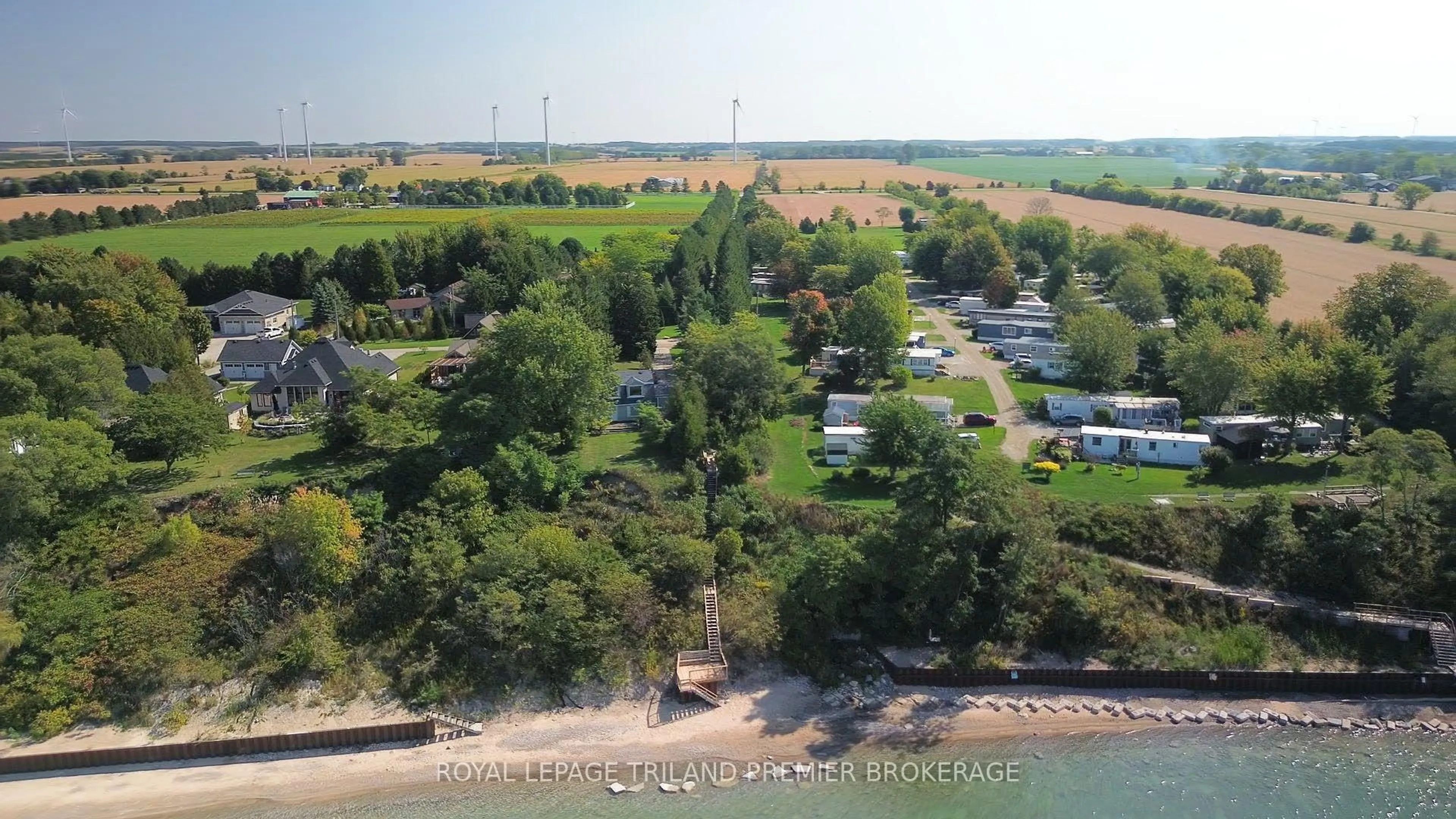 A pic from outside/outdoor area/front of a property/back of a property/a pic from drone, water/lake/river/ocean view for 72931 Bluewater, R.R.#2 Highway #8, Bluewater Ontario N0M 2T0