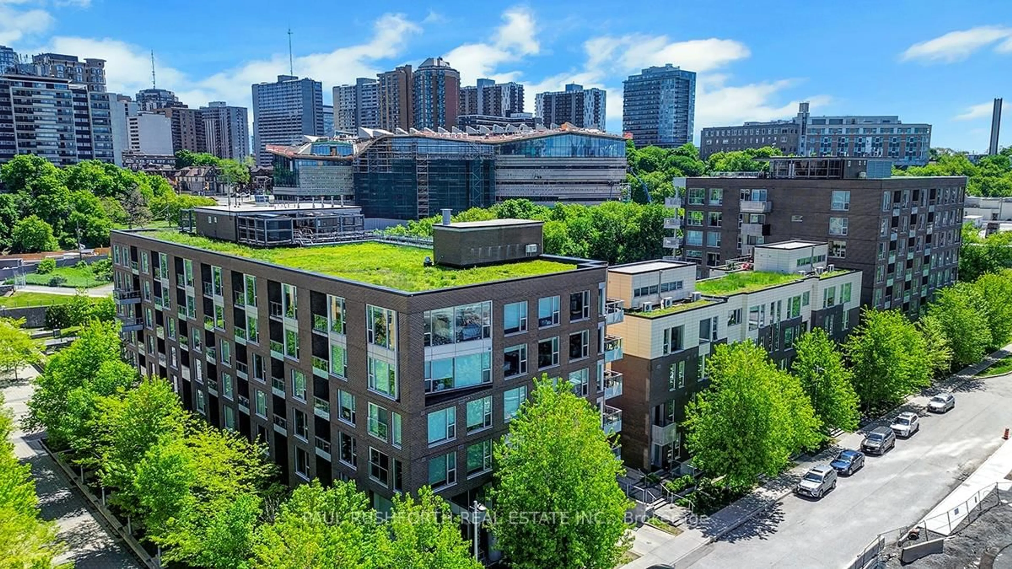 A pic from outside/outdoor area/front of a property/back of a property/a pic from drone, city buildings view from balcony for 300 Lett St #303, Ottawa Ontario K1R 0A8