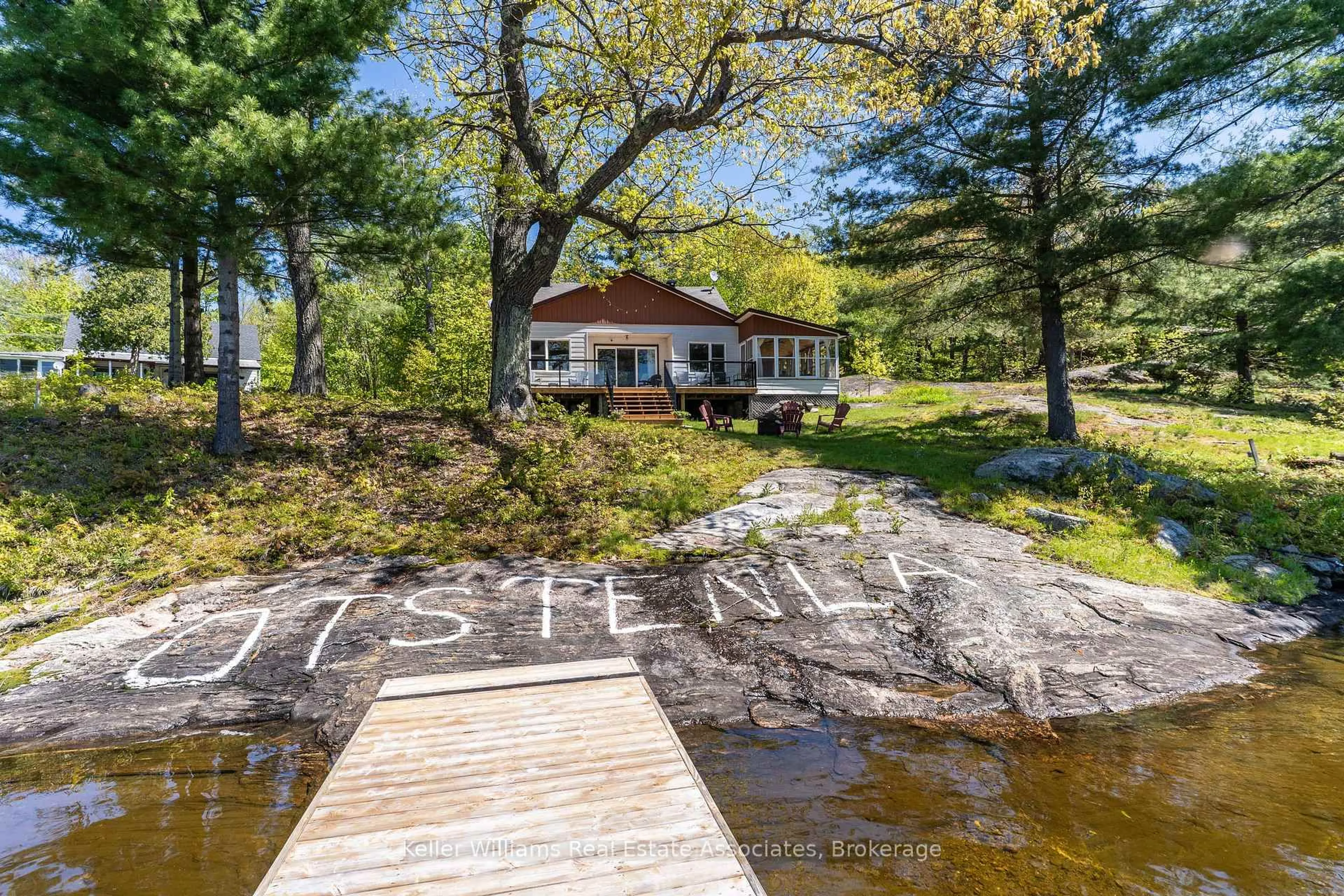 A pic from outside/outdoor area/front of a property/back of a property/a pic from drone, water/lake/river/ocean view for 1200 North Shore Dr #Unit 2, Gravenhurst Ontario P1P 1B8