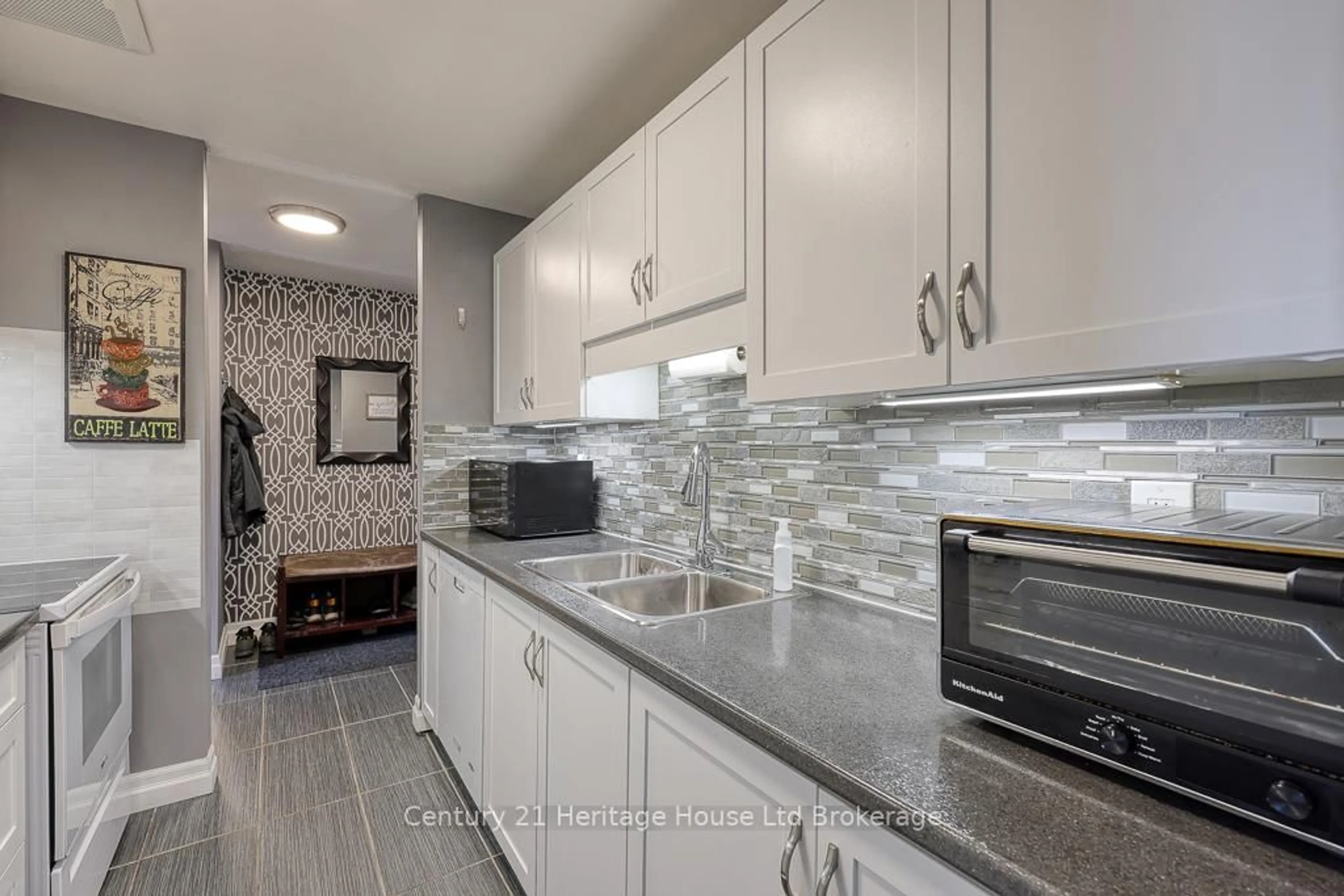Open concept kitchen, ceramic/tile floor for 1580 Ernest Ave #301, London South Ontario N6E 2T9
