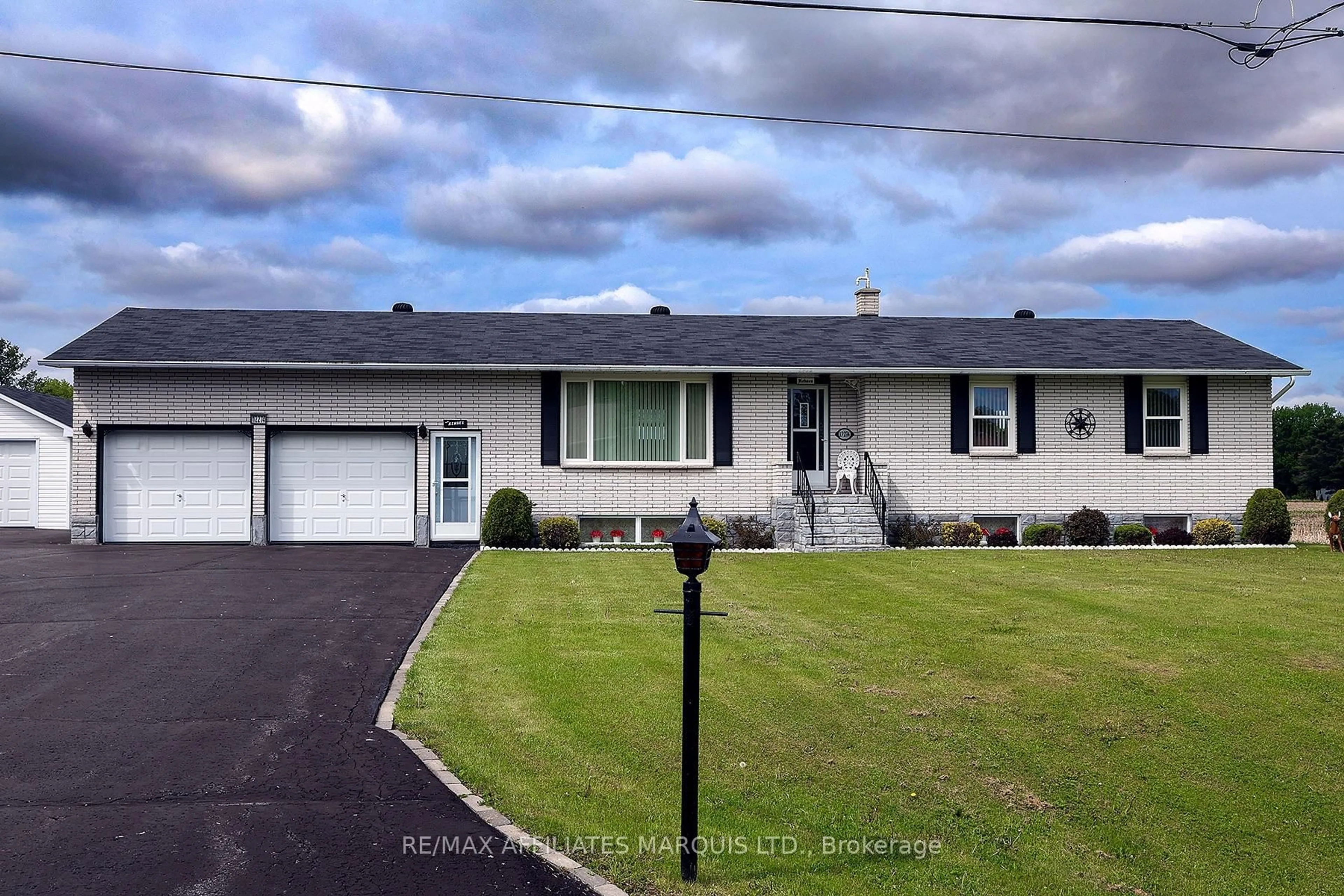 Home with vinyl exterior material, street for 12274 County Rd 18 Rd, South Dundas Ontario K0C 2H0