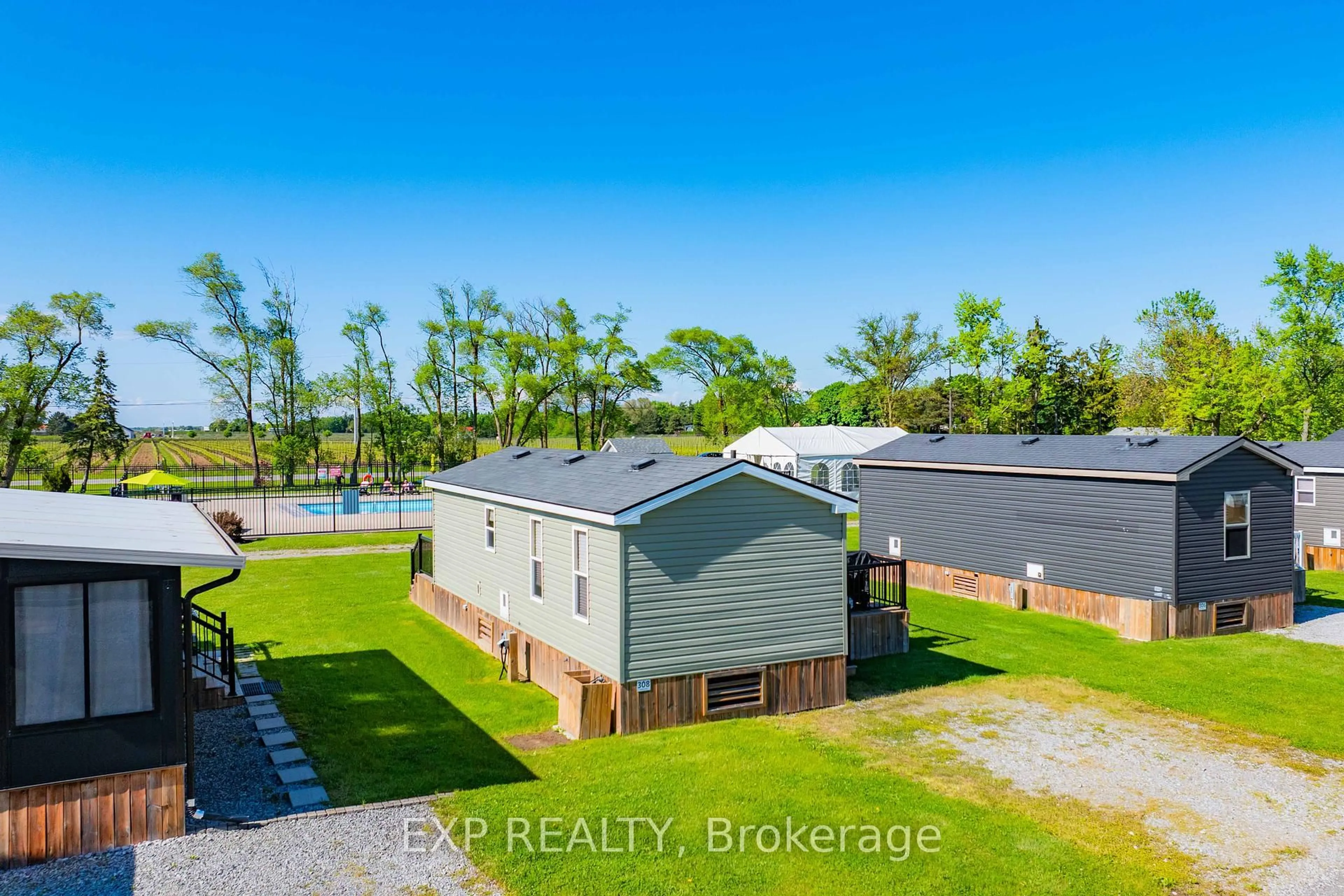 A pic from outside/outdoor area/front of a property/back of a property/a pic from drone, water/lake/river/ocean view for 1501 Line 8 Rd #308, Niagara-on-the-Lake Ontario L0S 1J0