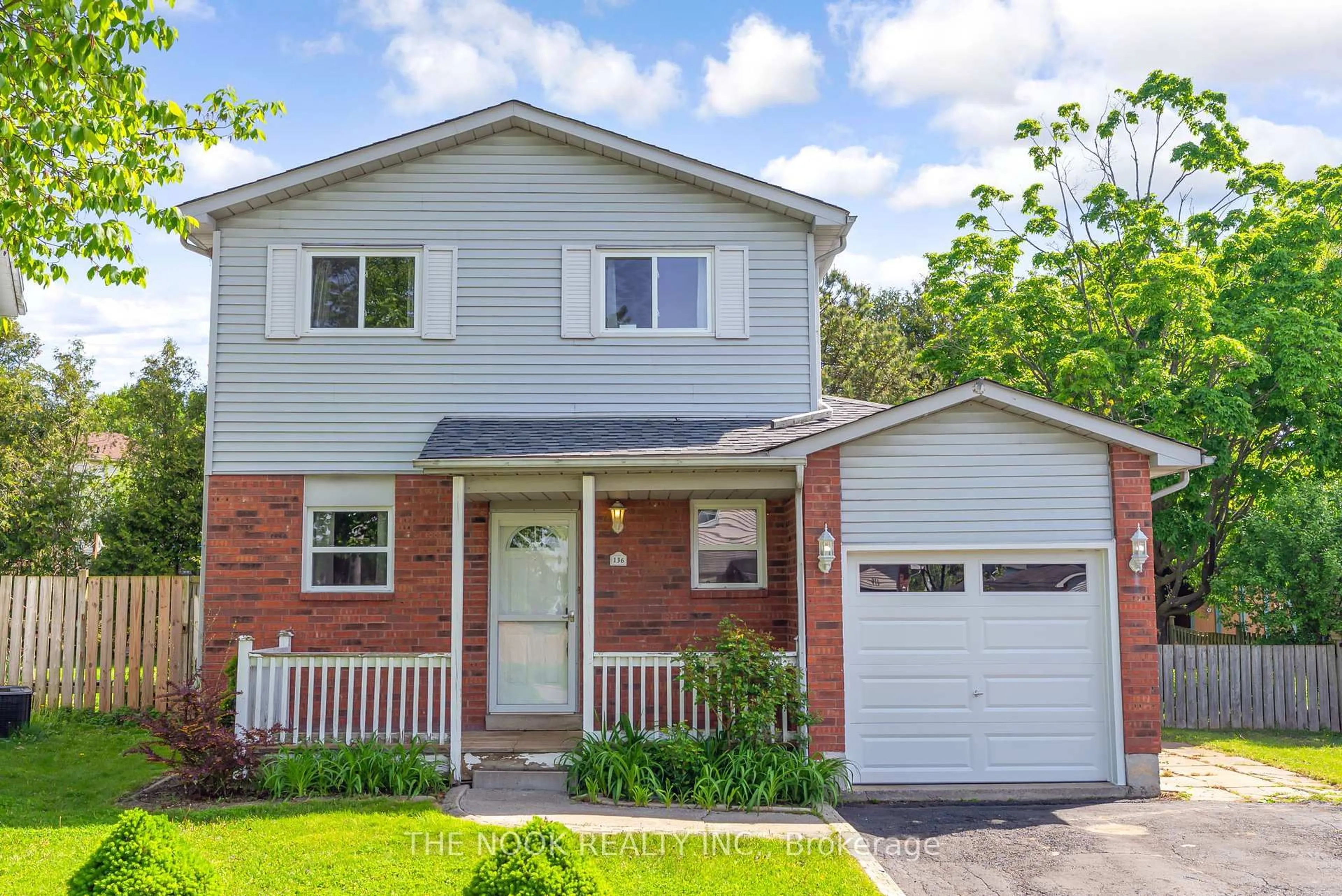 Home with brick exterior material, street for 136 Peacock Blvd, Port Hope Ontario L1A 4G2