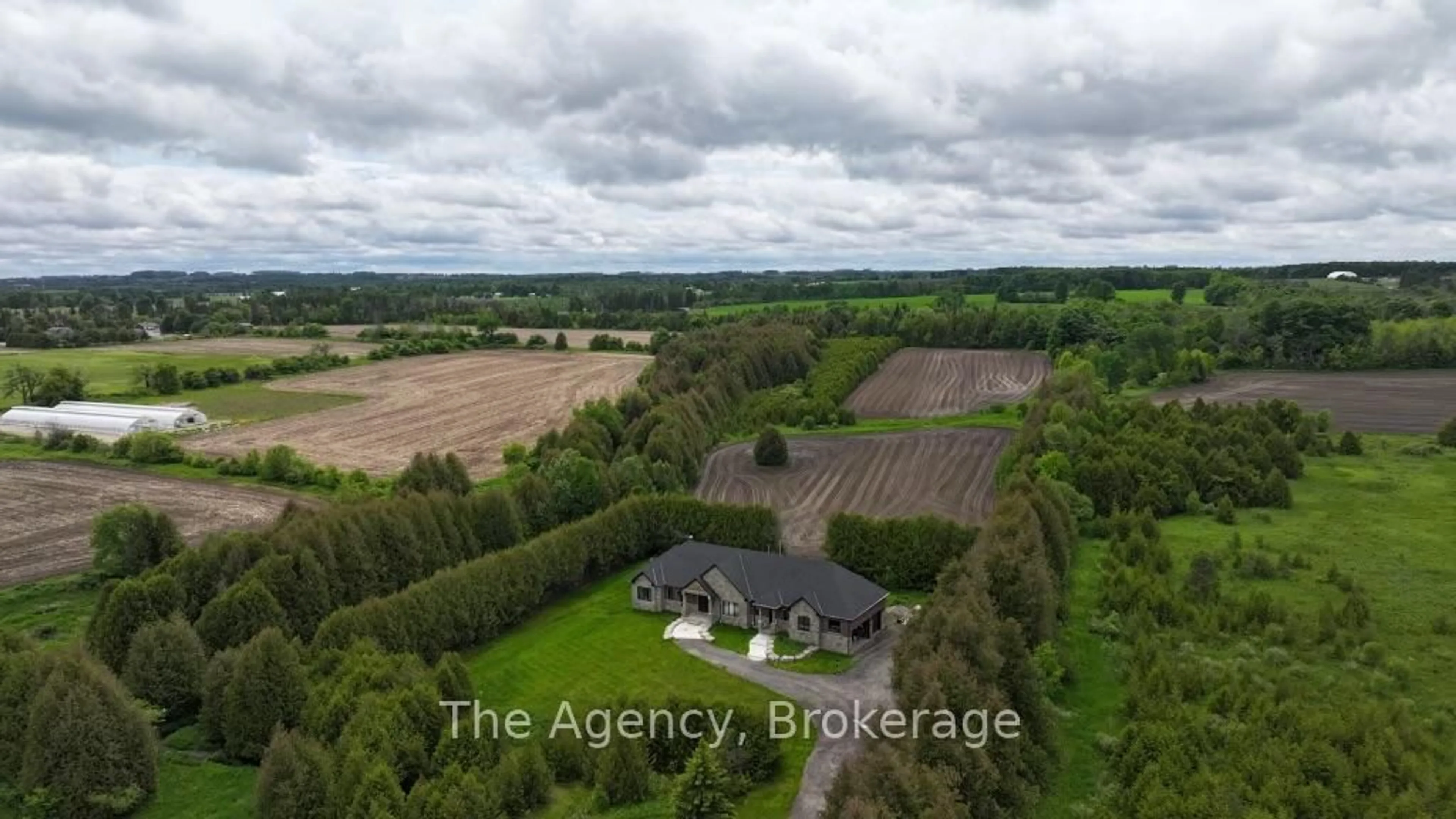 A pic from outside/outdoor area/front of a property/back of a property/a pic from drone, unknown for 634060 Highway 10 Highway, Mono Ontario L9W 5P4