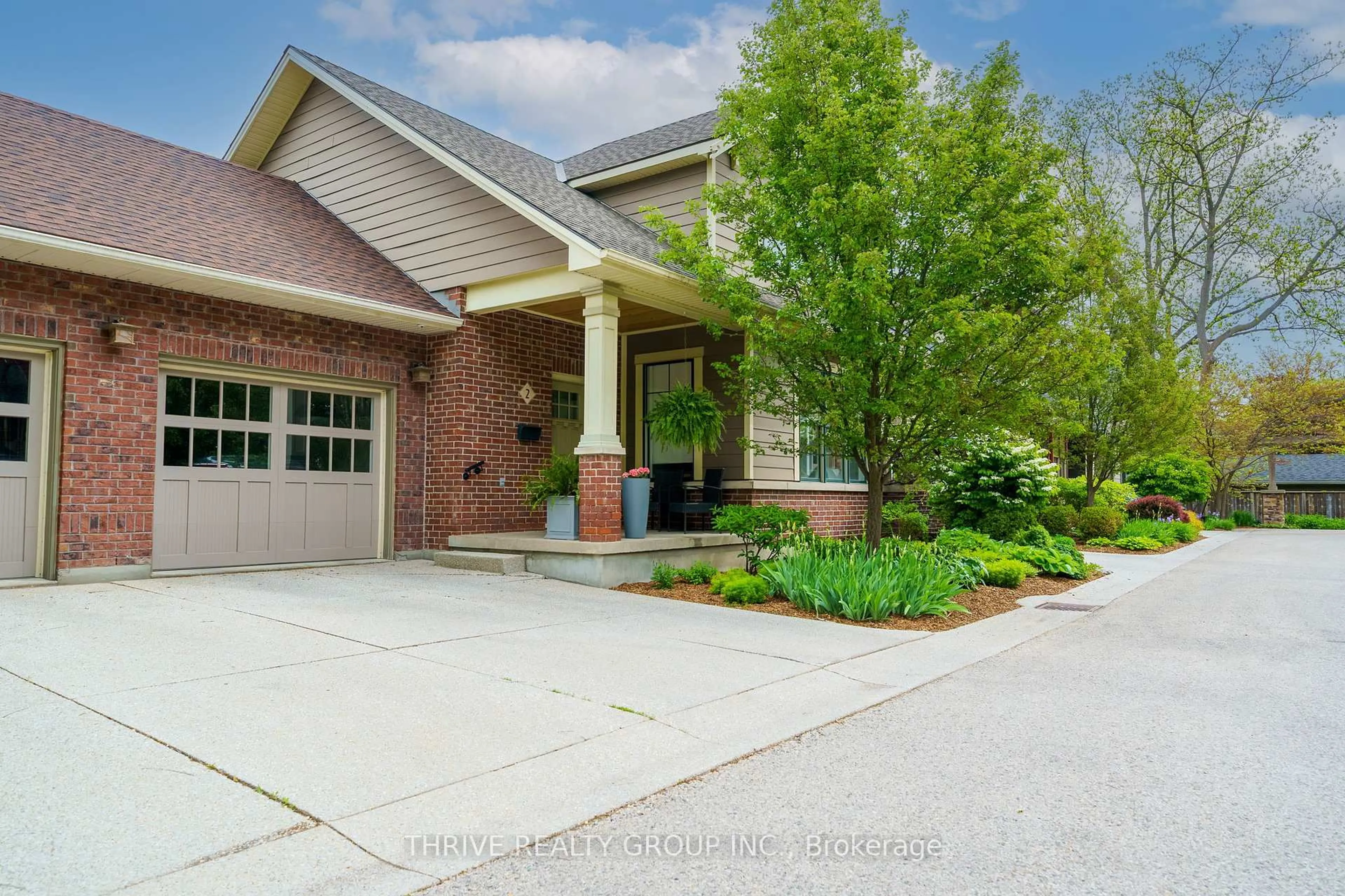 Home with brick exterior material, street for 352 Ridout St #2, London South Ontario N6C 3Z5