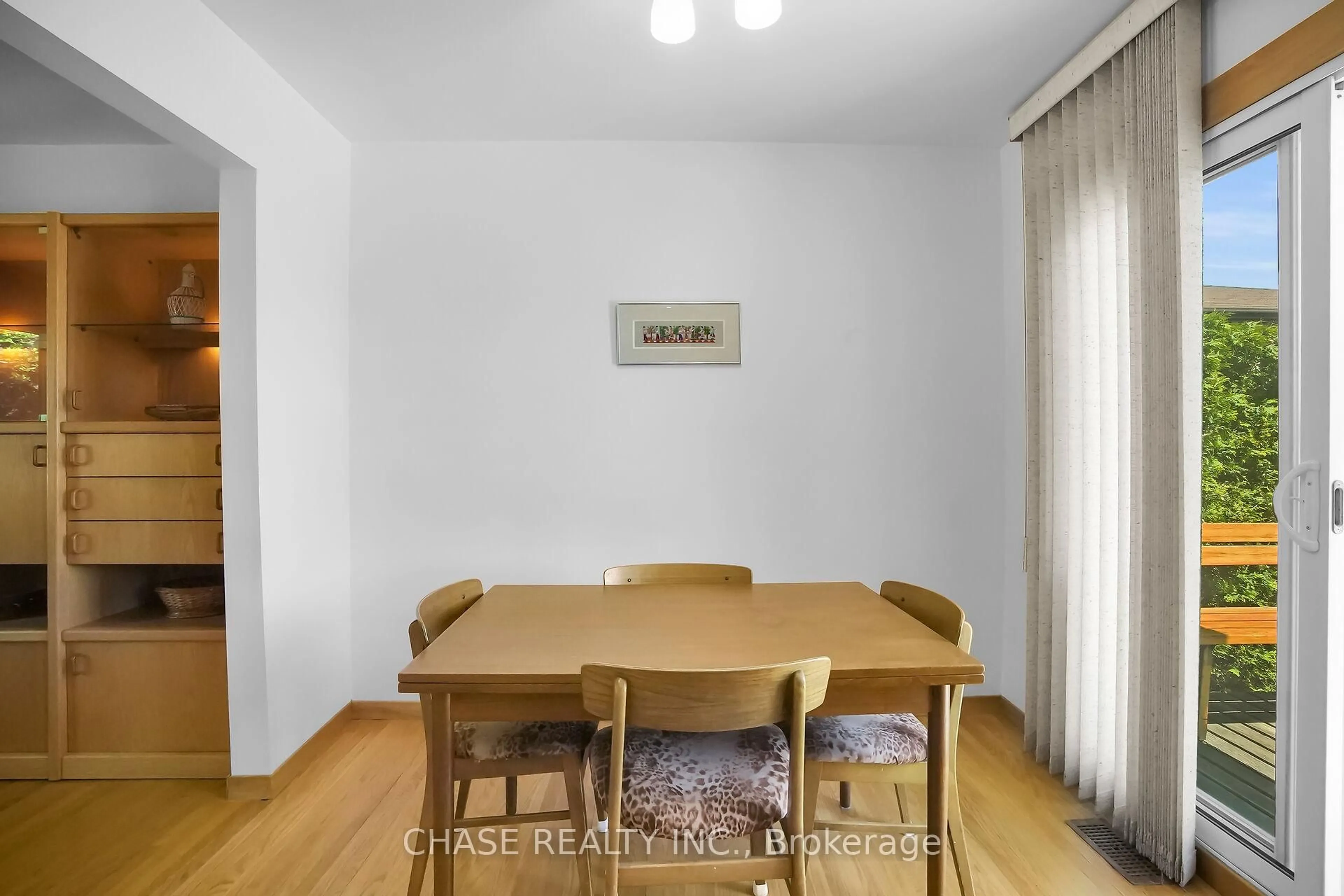 Dining room, wood/laminate floor for 51 Woodrow Cres, London South Ontario N6E 1E7