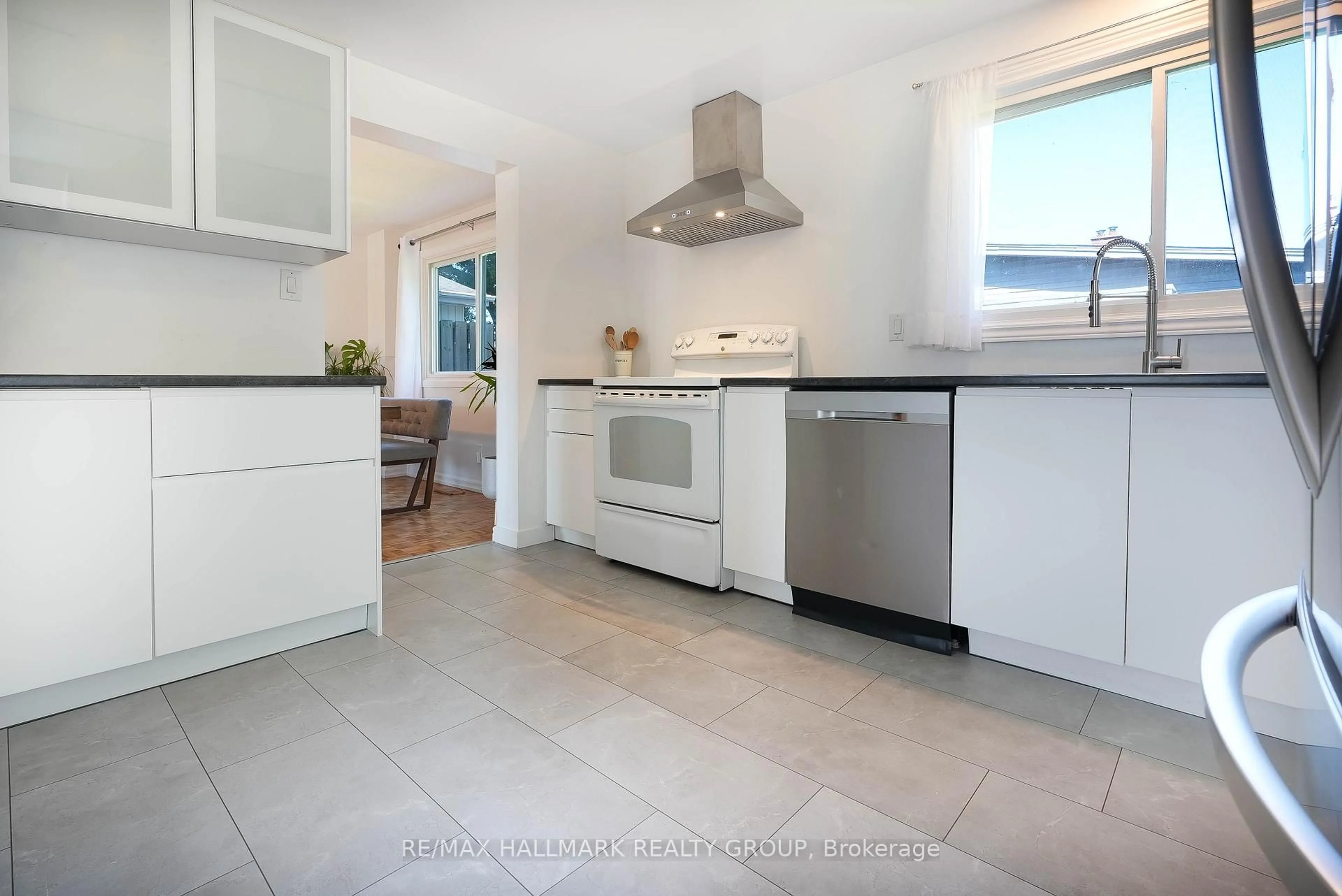 Open concept kitchen, ceramic/tile floor for 1853 Elmridge Dr, Ottawa Ontario K1J 6R8