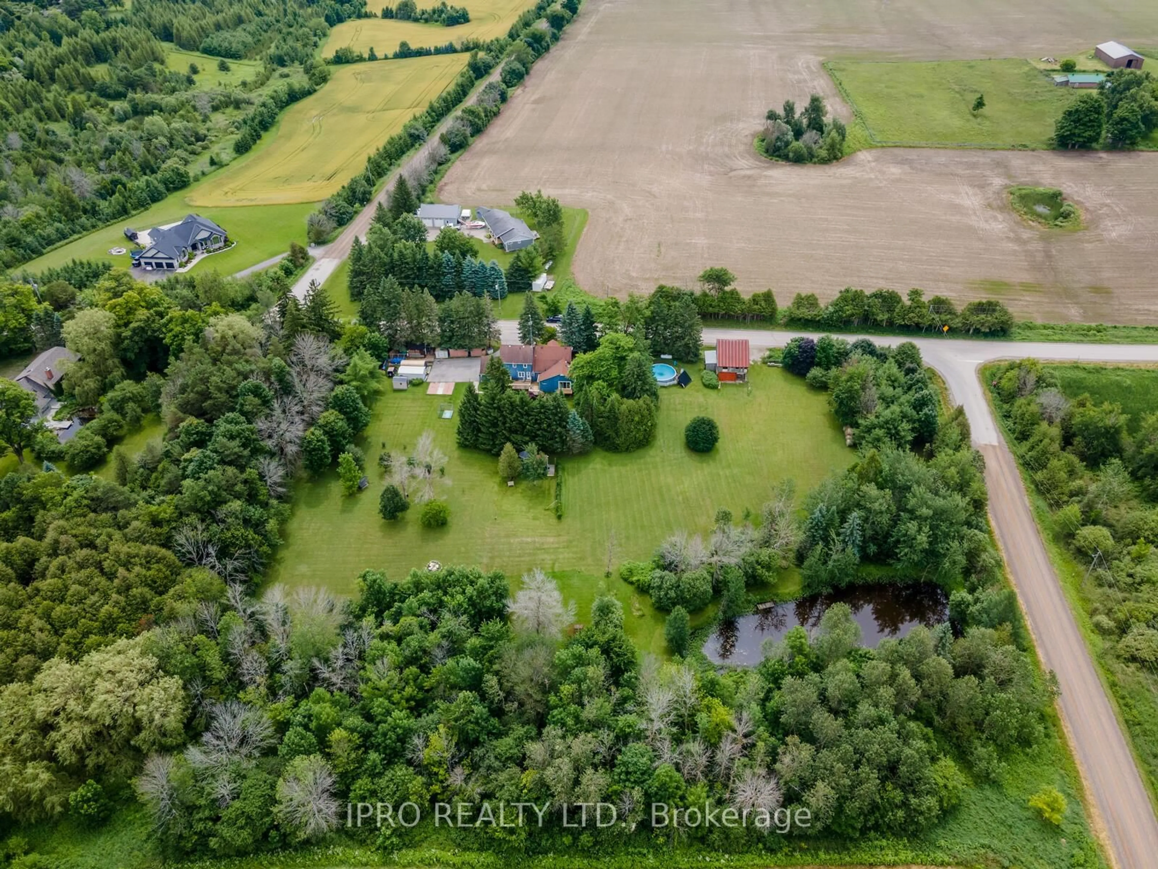 A pic from outside/outdoor area/front of a property/back of a property/a pic from drone, unknown for 9206 Sideroad 17 Rd, Erin Ontario N0B 1Z0