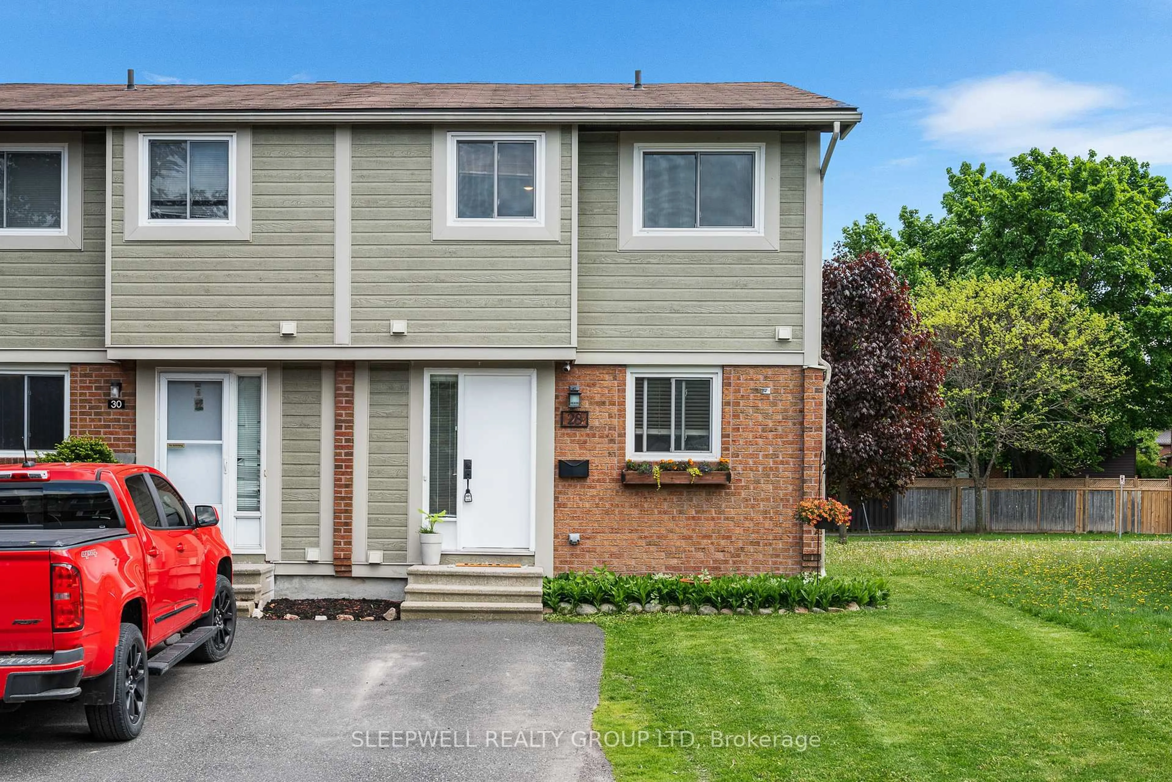 Home with vinyl exterior material, street for 28 Barrow Cres #82, Ottawa Ontario K2L 2K1