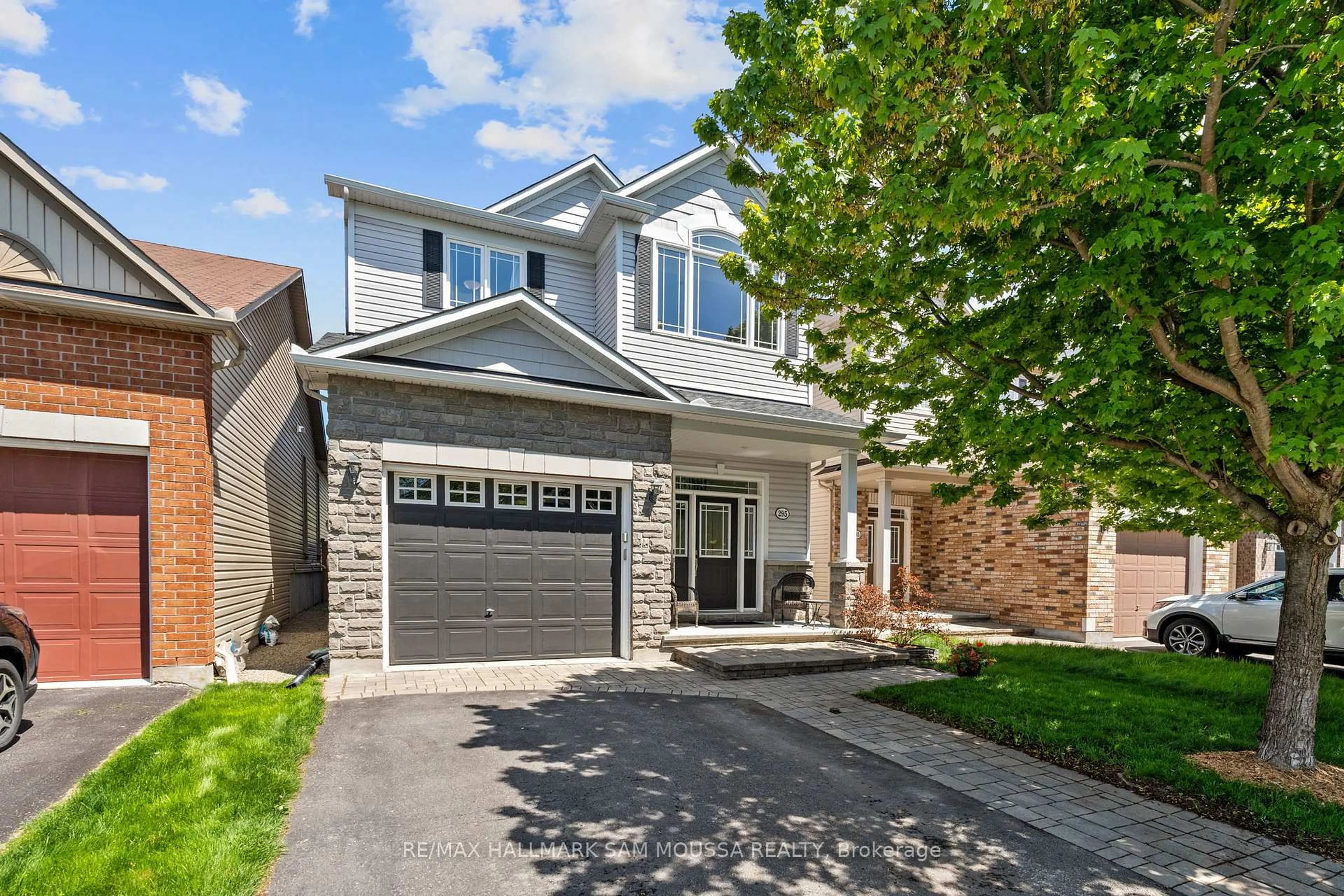 Home with brick exterior material, street for 295 Harthill Way, Ottawa Ontario K2J 0P3