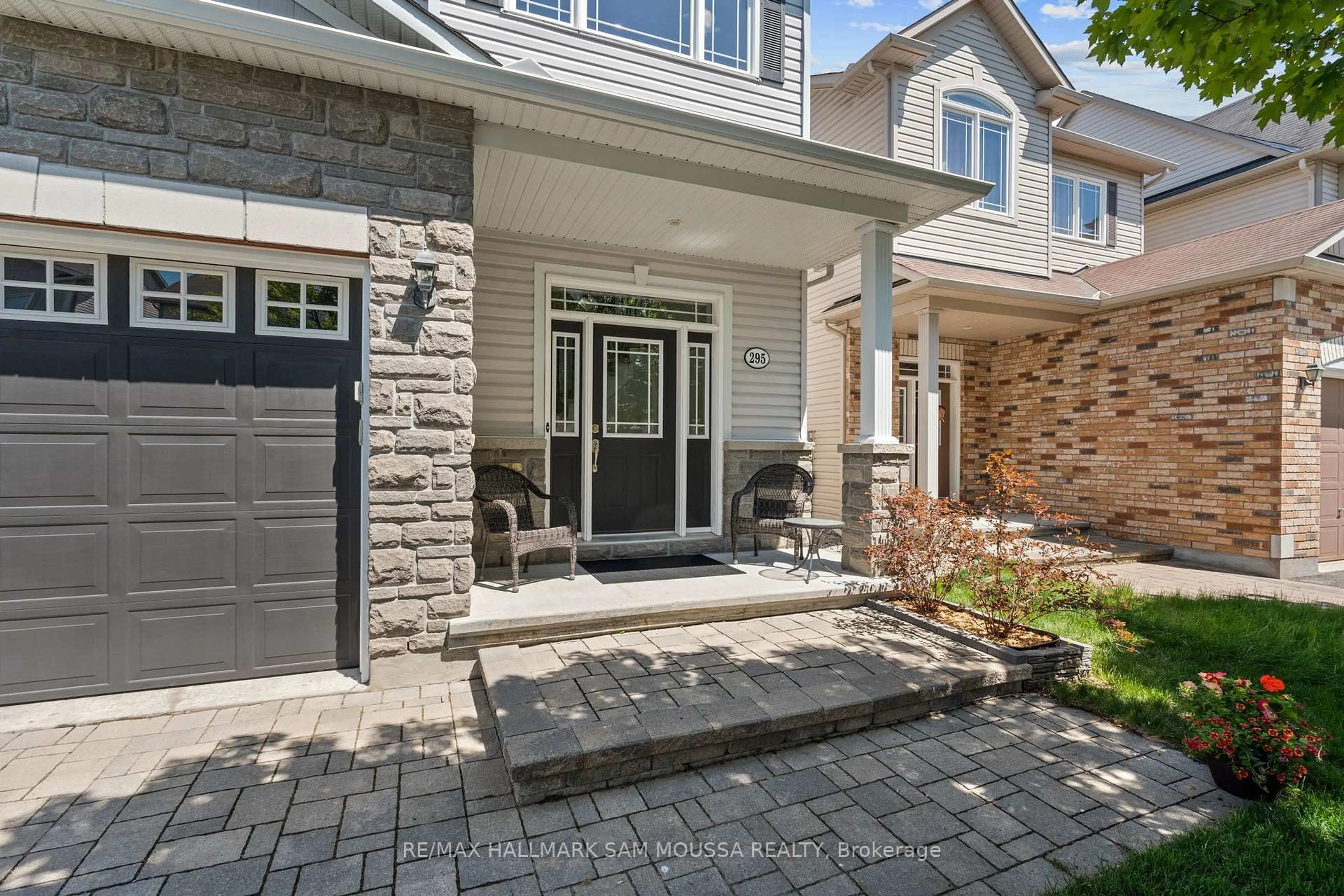 Home with brick exterior material, street for 295 Harthill Way, Ottawa Ontario K2J 0P3