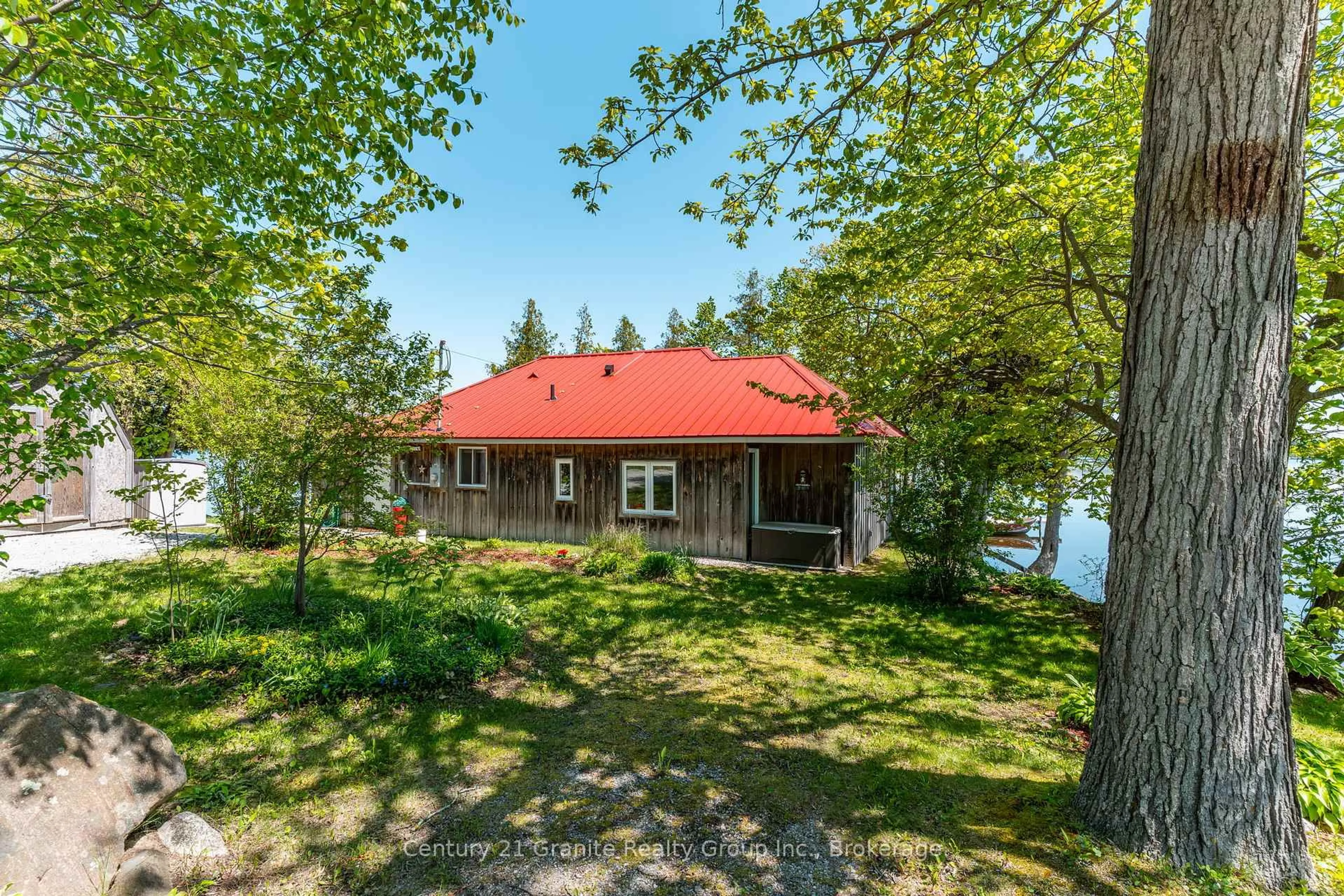A pic from outside/outdoor area/front of a property/back of a property/a pic from drone, water/lake/river/ocean view for 359 Avery Point Rd, Kawartha Lakes Ontario L0K 1W0