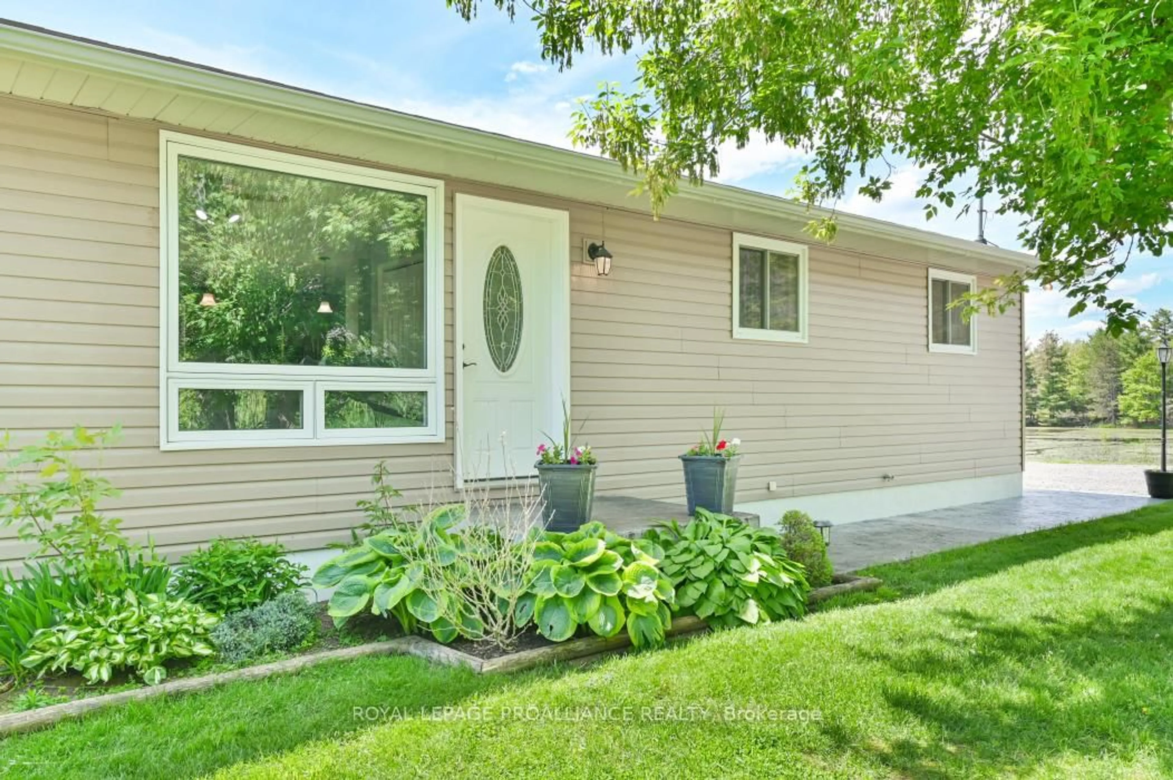 Home with vinyl exterior material, street for 429 Elzevir Rd, Tweed Ontario K0K 3J0