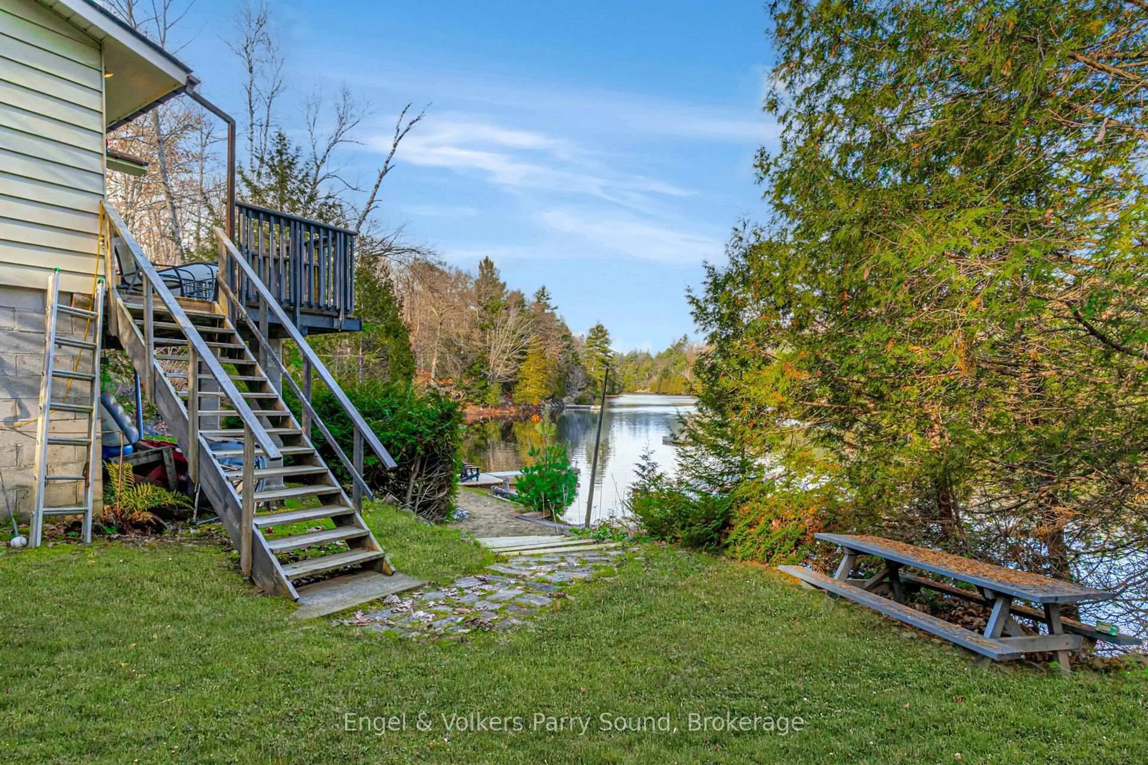 A pic from outside/outdoor area/front of a property/back of a property/a pic from drone, water/lake/river/ocean view for 27 Lower Lane, Seguin Ontario P2A 0B2