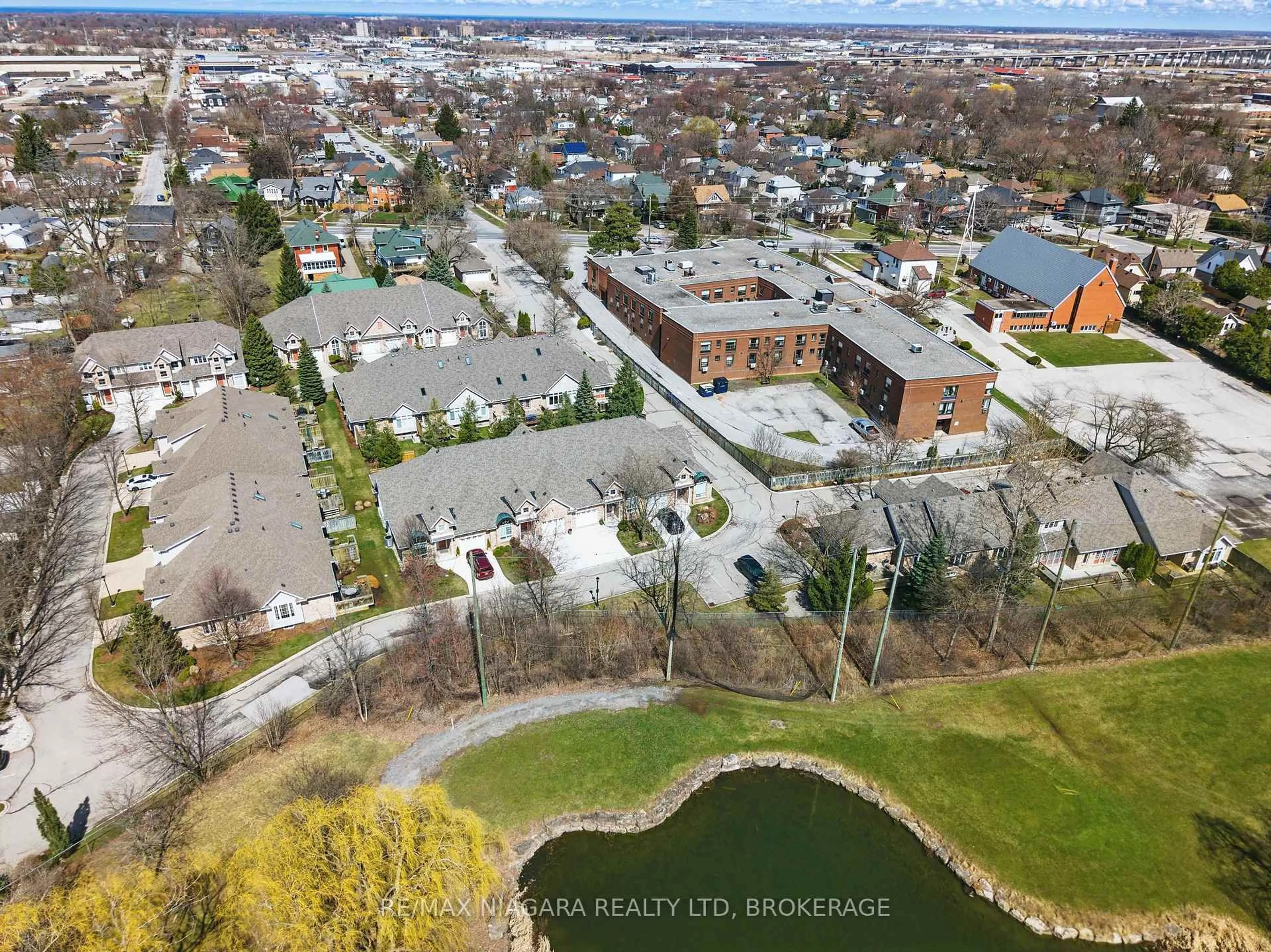 A pic from outside/outdoor area/front of a property/back of a property/a pic from drone, unknown for 308 Queenston St #18, St. Catharines Ontario L2P 2X4
