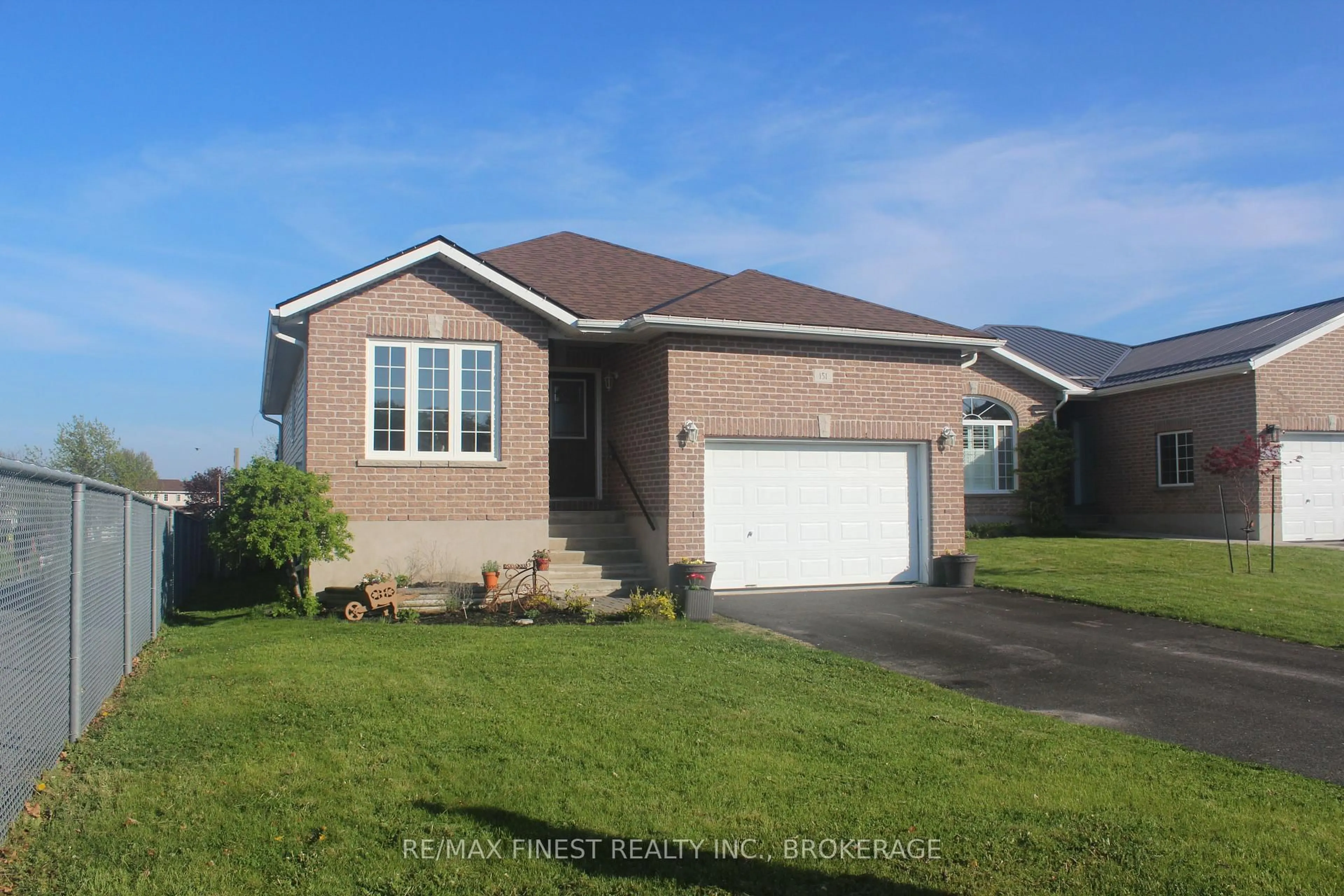 Home with vinyl exterior material, street for 151 Macdougall Dr, Loyalist Ontario K7N 0A2