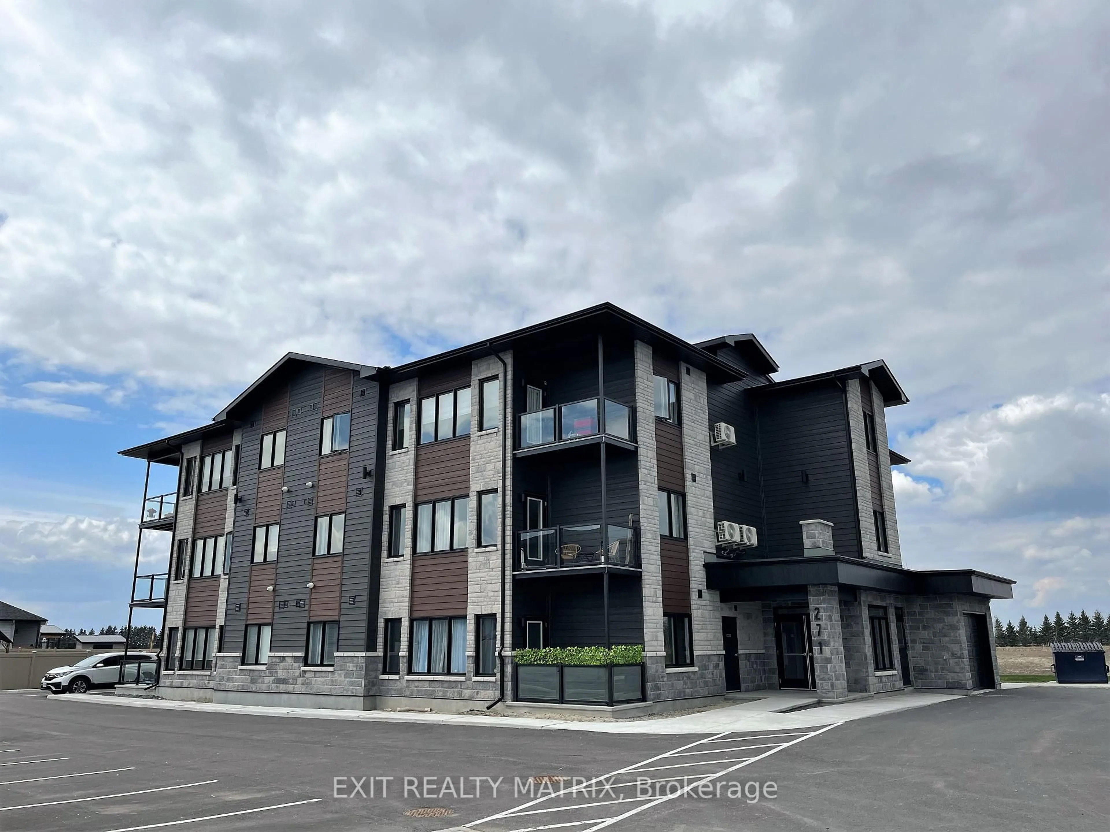 A pic from outside/outdoor area/front of a property/back of a property/a pic from drone, building for 271 Belfort St #103, Russell Ontario K0A 1W0