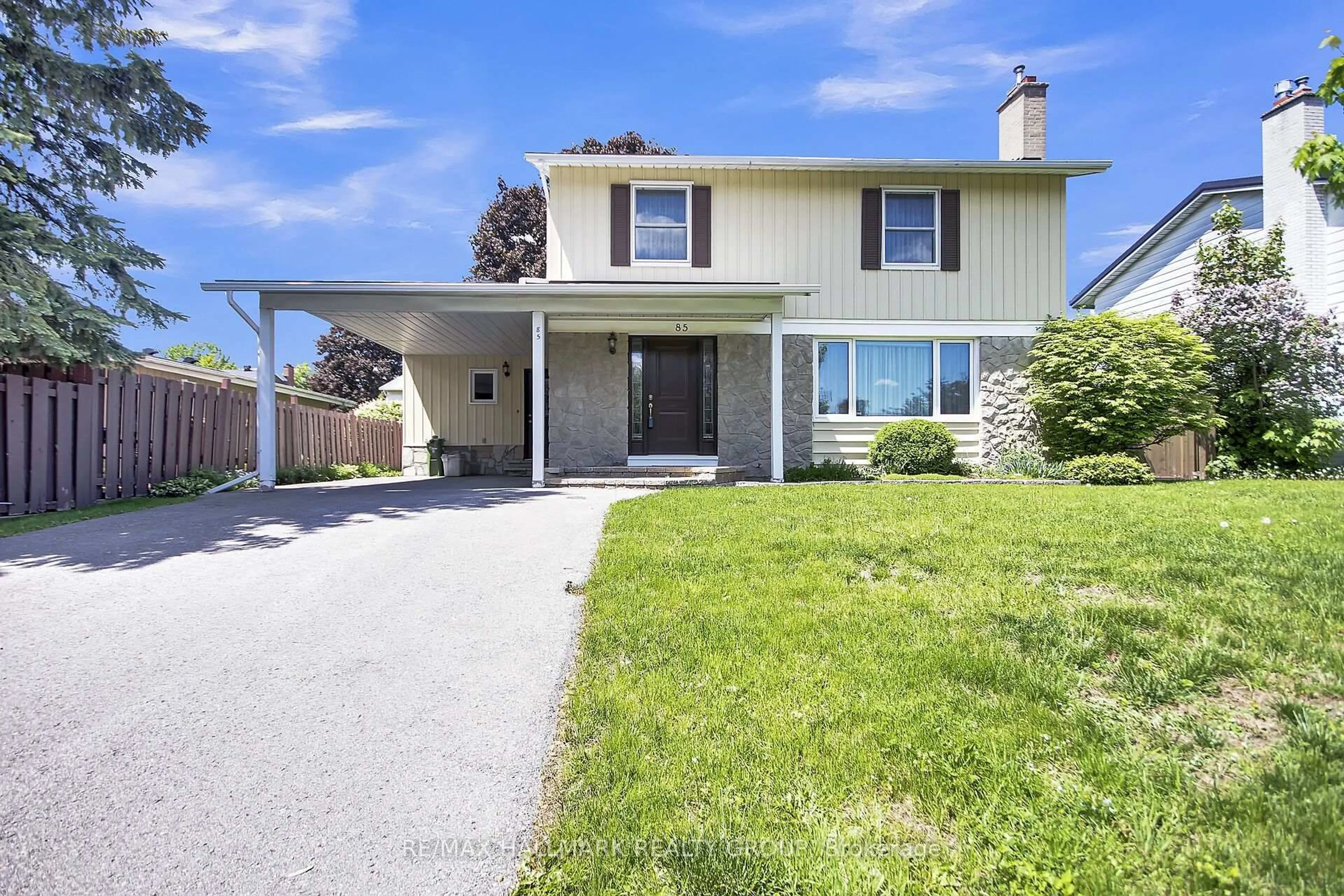 Home with vinyl exterior material, street for 85 Country Lane, Ottawa Ontario K2L 1J4