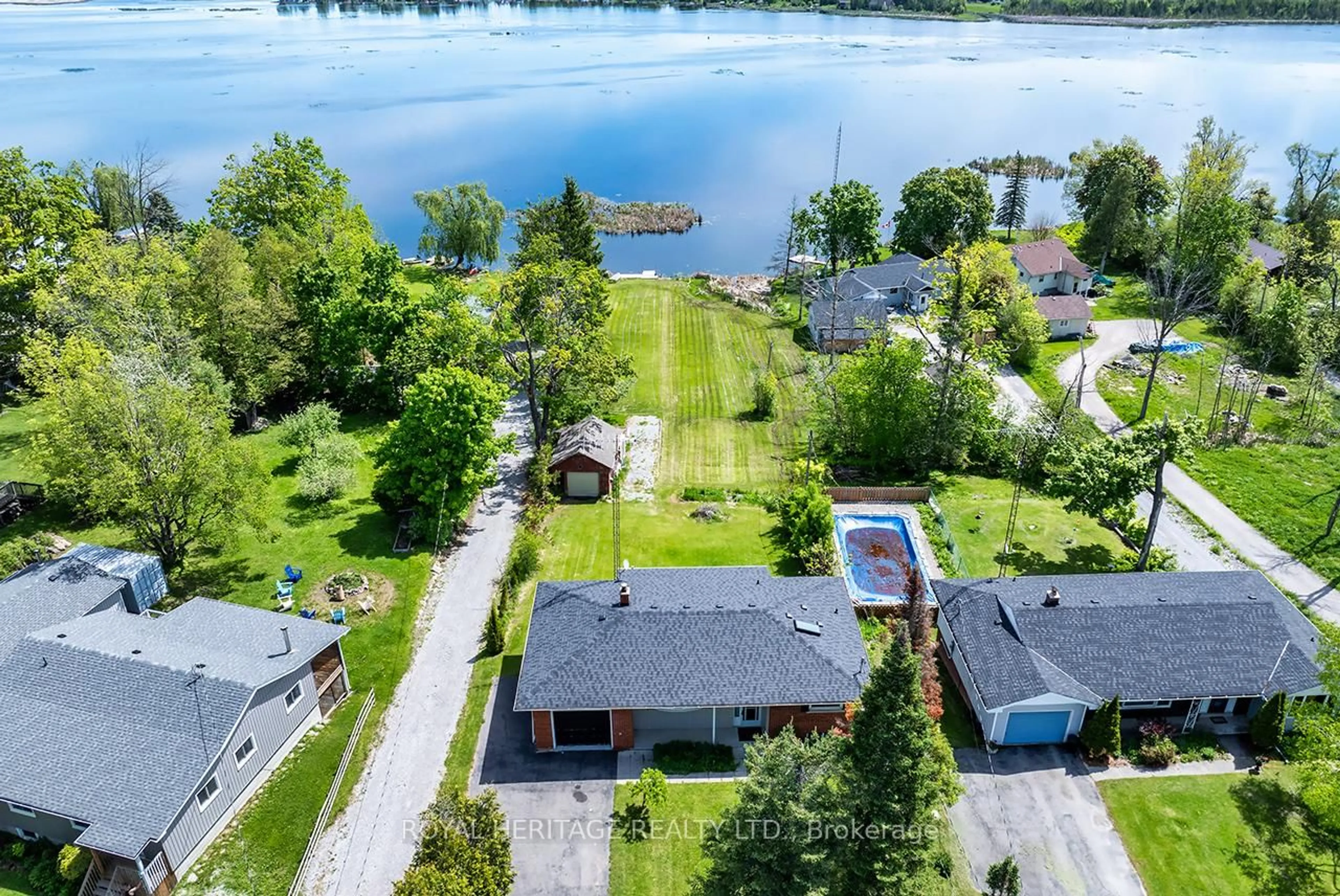 A pic from outside/outdoor area/front of a property/back of a property/a pic from drone, water/lake/river/ocean view for 28 Butternut Dr, Kawartha Lakes Ontario K9V 4R1