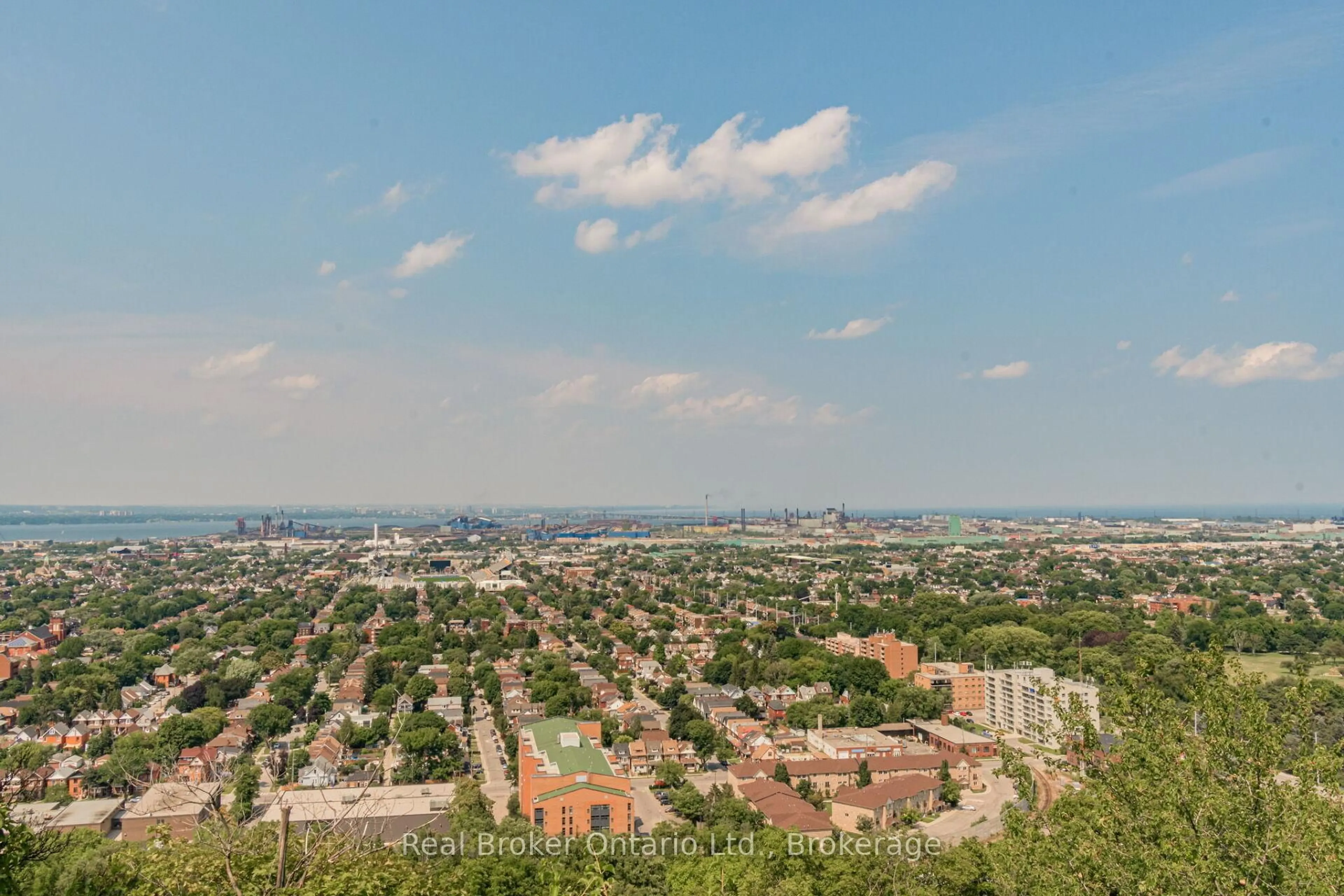 A pic from outside/outdoor area/front of a property/back of a property/a pic from drone, city buildings view from balcony for 5 East 36th St #205C, Hamilton Ontario L8V 3Y6