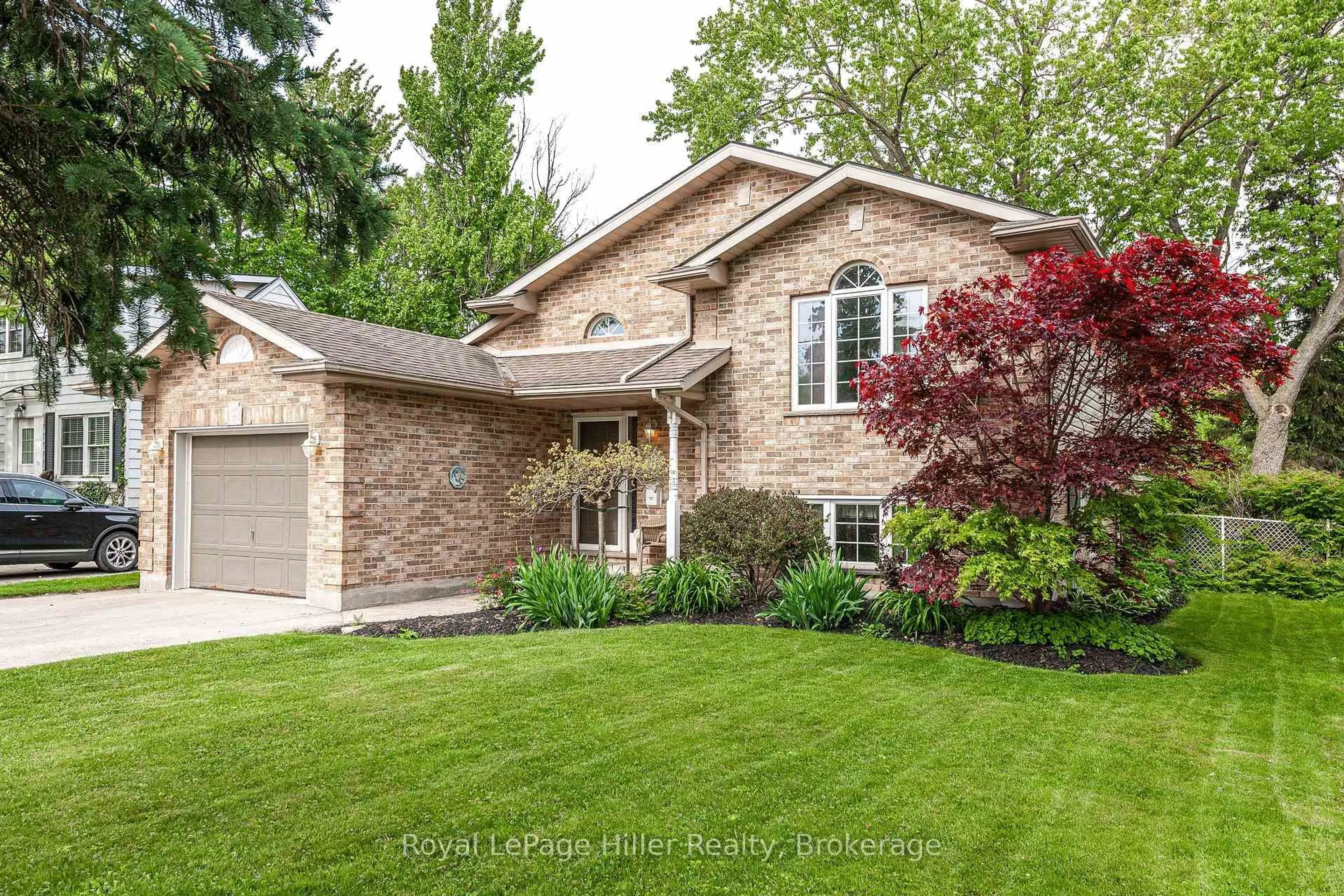 Home with brick exterior material, street for 70 Pleasant Dr, Stratford Ontario N5A 4X3