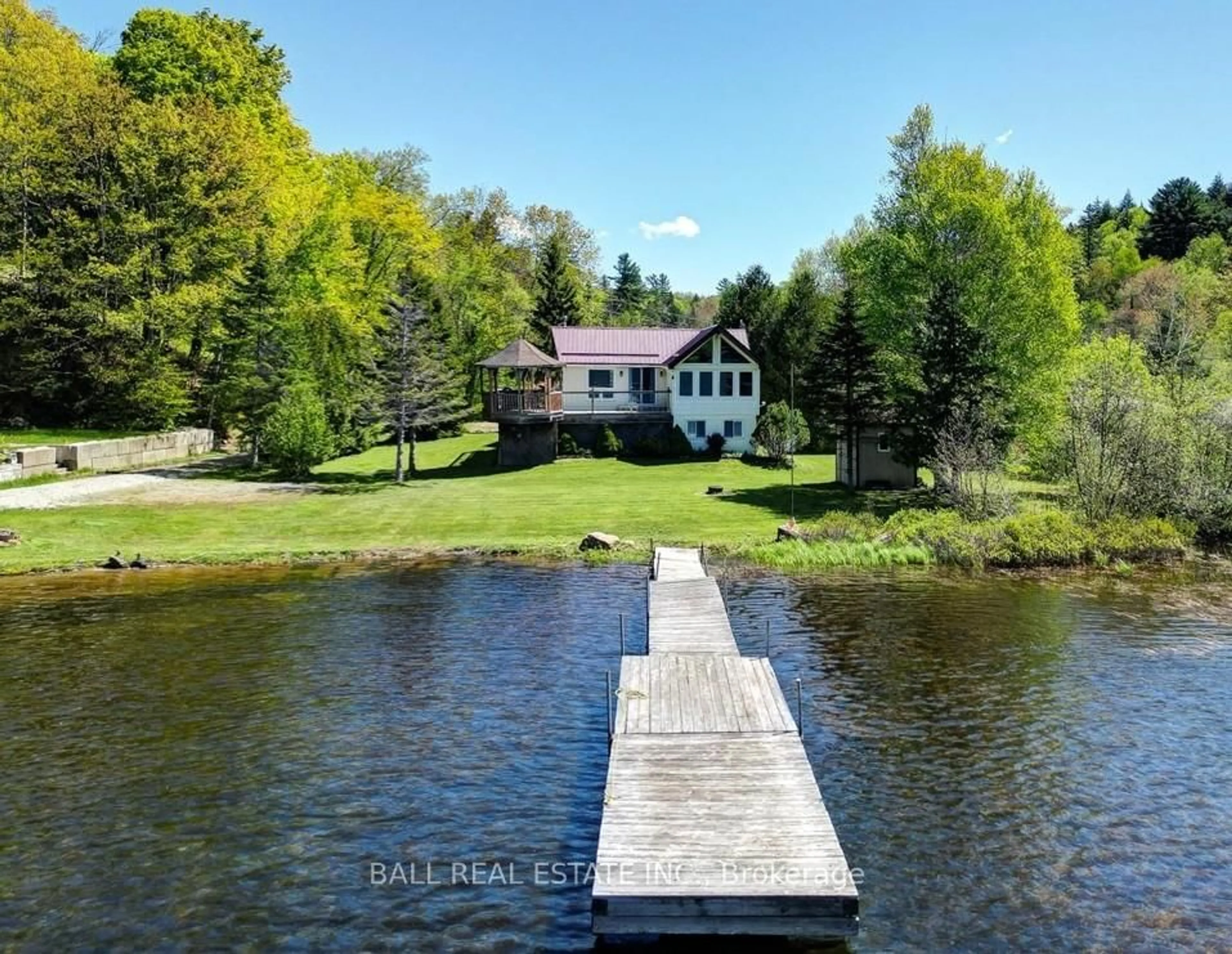 A pic from outside/outdoor area/front of a property/back of a property/a pic from drone, water/lake/river/ocean view for 391 Pine Dr, Bancroft Ontario K0L 1C0