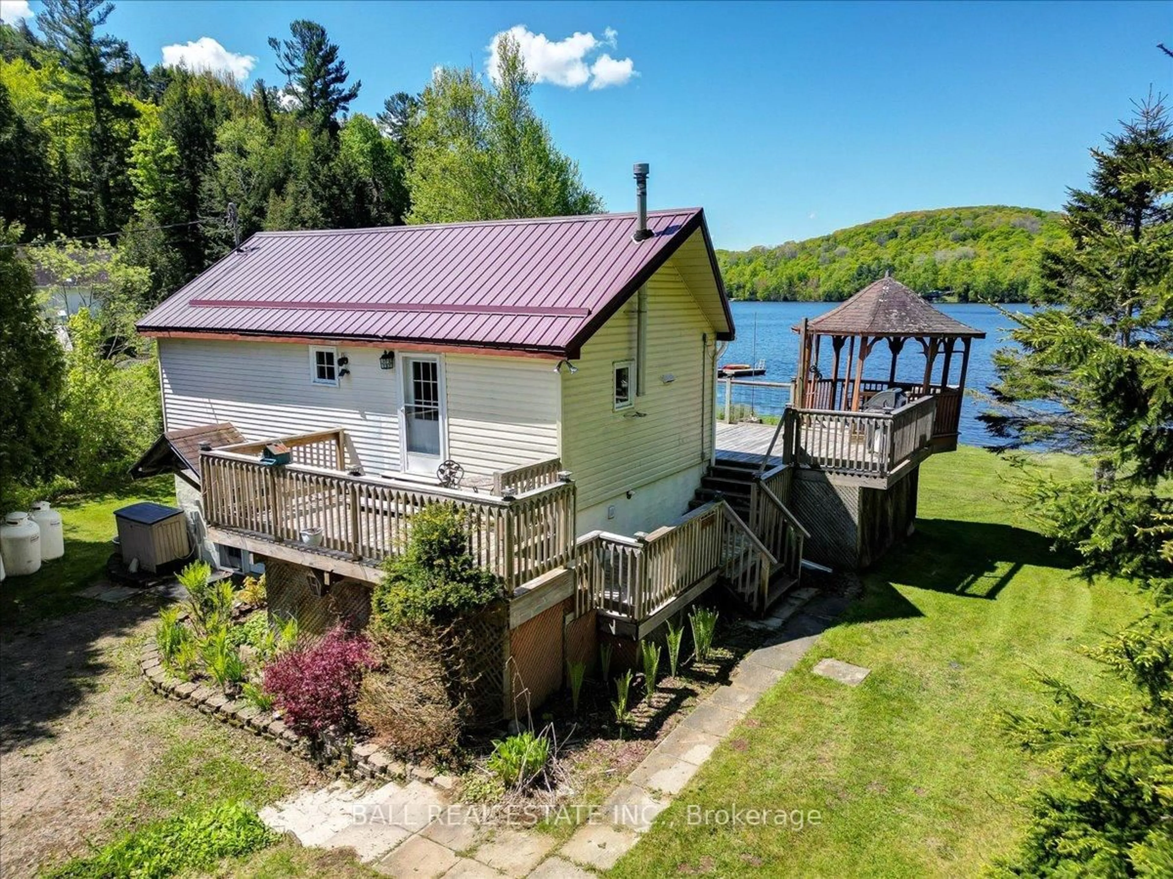 A pic from outside/outdoor area/front of a property/back of a property/a pic from drone, water/lake/river/ocean view for 391 Pine Dr, Bancroft Ontario K0L 1C0