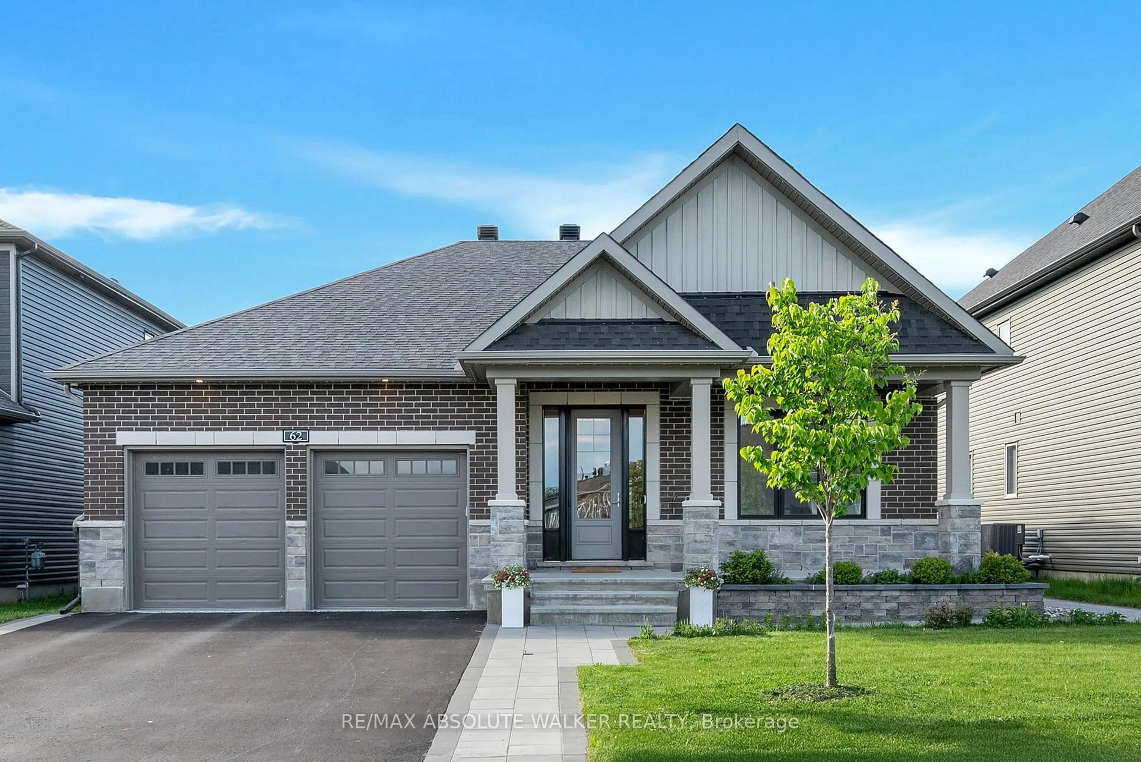 Home with brick exterior material, street for 62 Yacht Terr, Manotick Ontario K4M 0N3