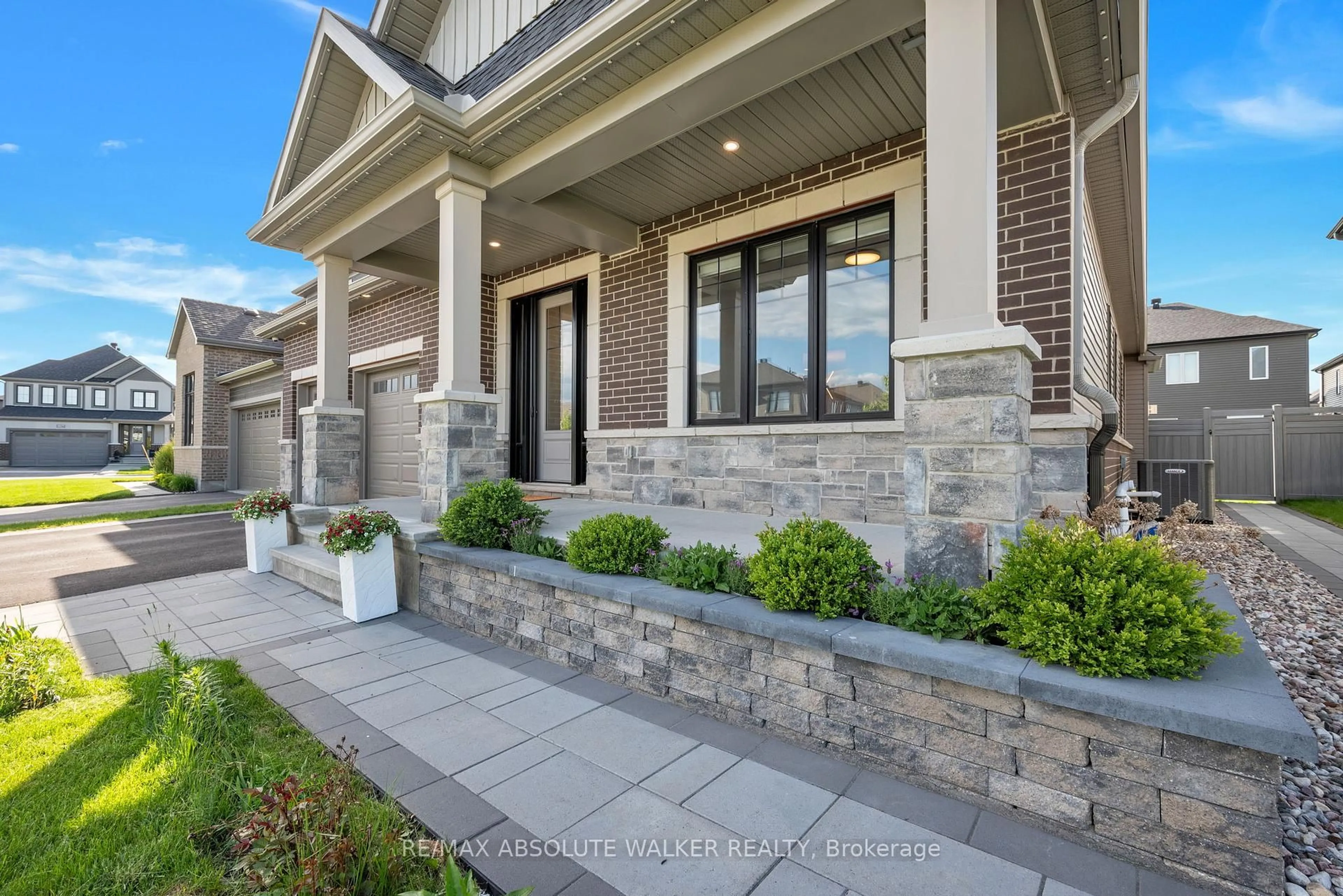 Home with brick exterior material, street for 62 Yacht Terr, Manotick Ontario K4M 0N3
