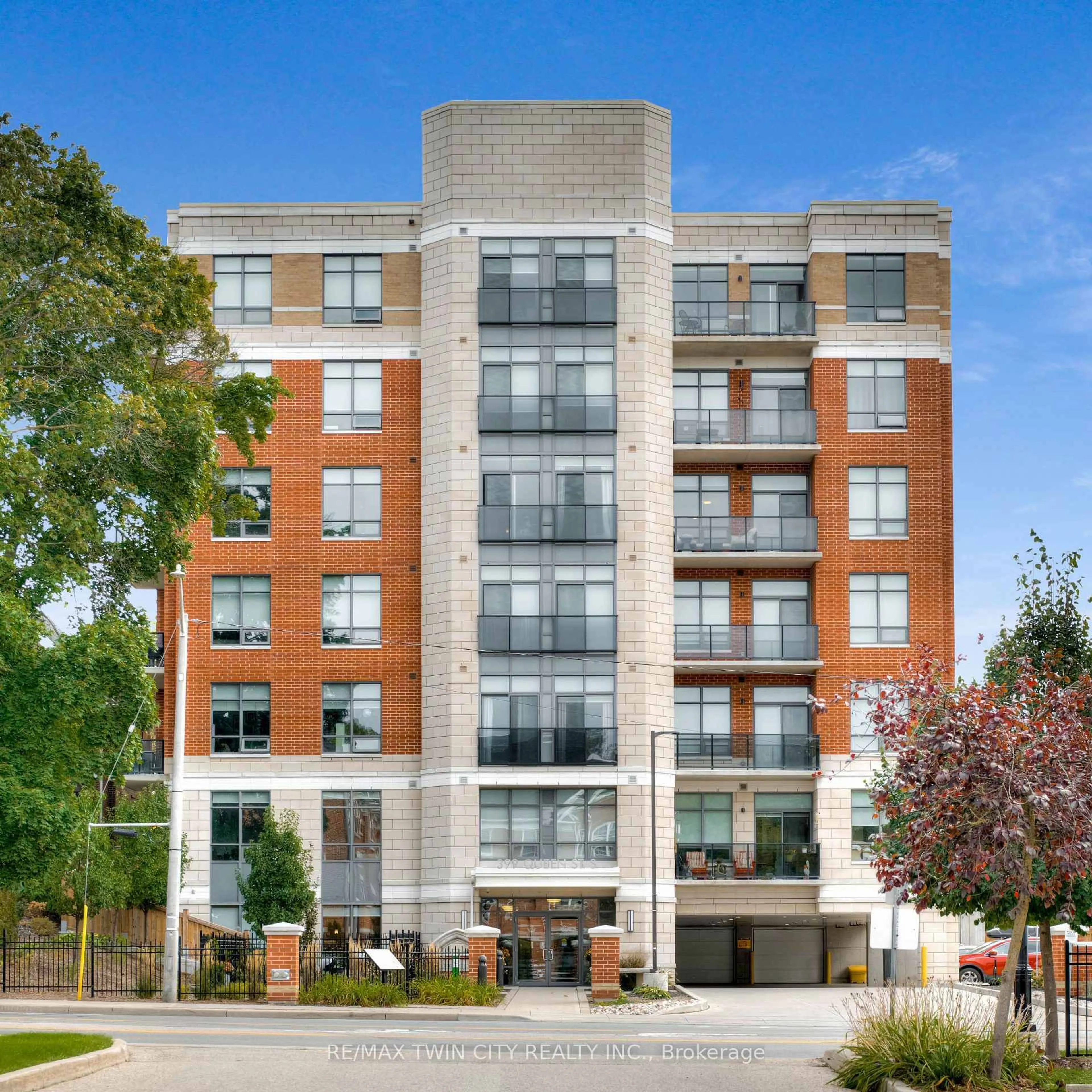 Home with brick exterior material, building for 399 Queen St #211, Kitchener Ontario N2G 0C4