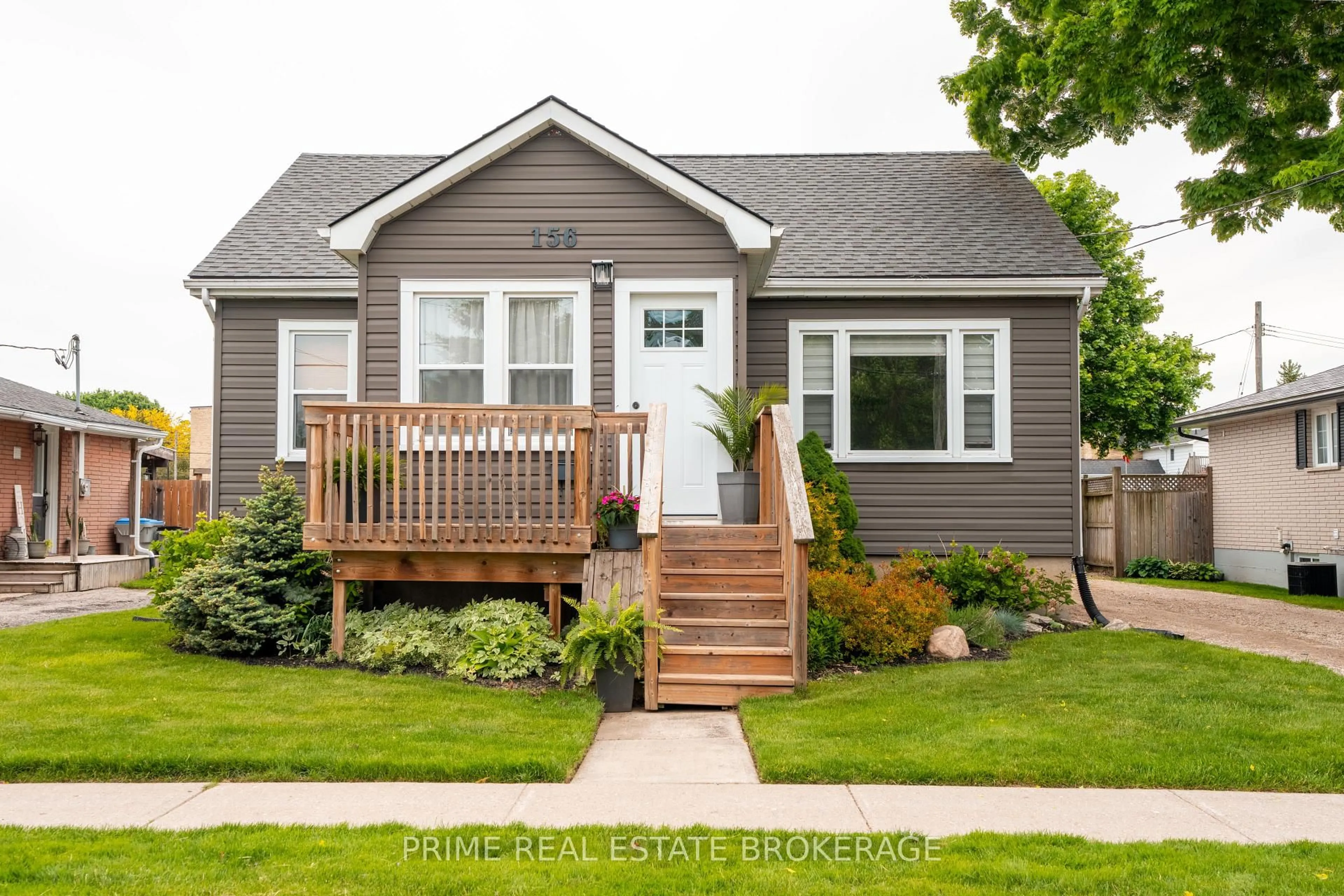 Home with vinyl exterior material, street for 156 William St, South Huron Ontario N0M 1S2