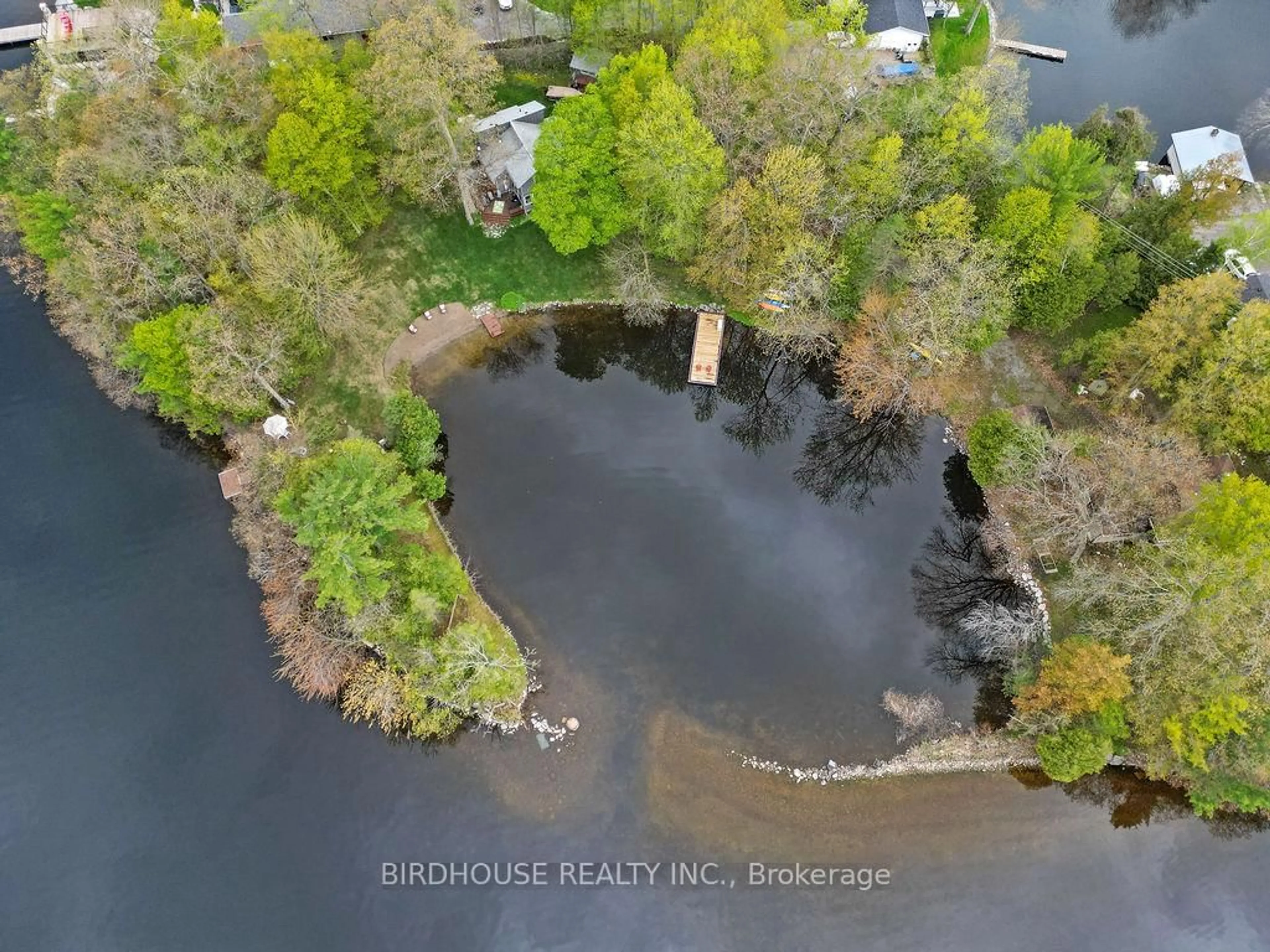 A pic from outside/outdoor area/front of a property/back of a property/a pic from drone, water/lake/river/ocean view for 68 Fire Route 103B N/A, Trent Lakes Ontario K0M 1A0