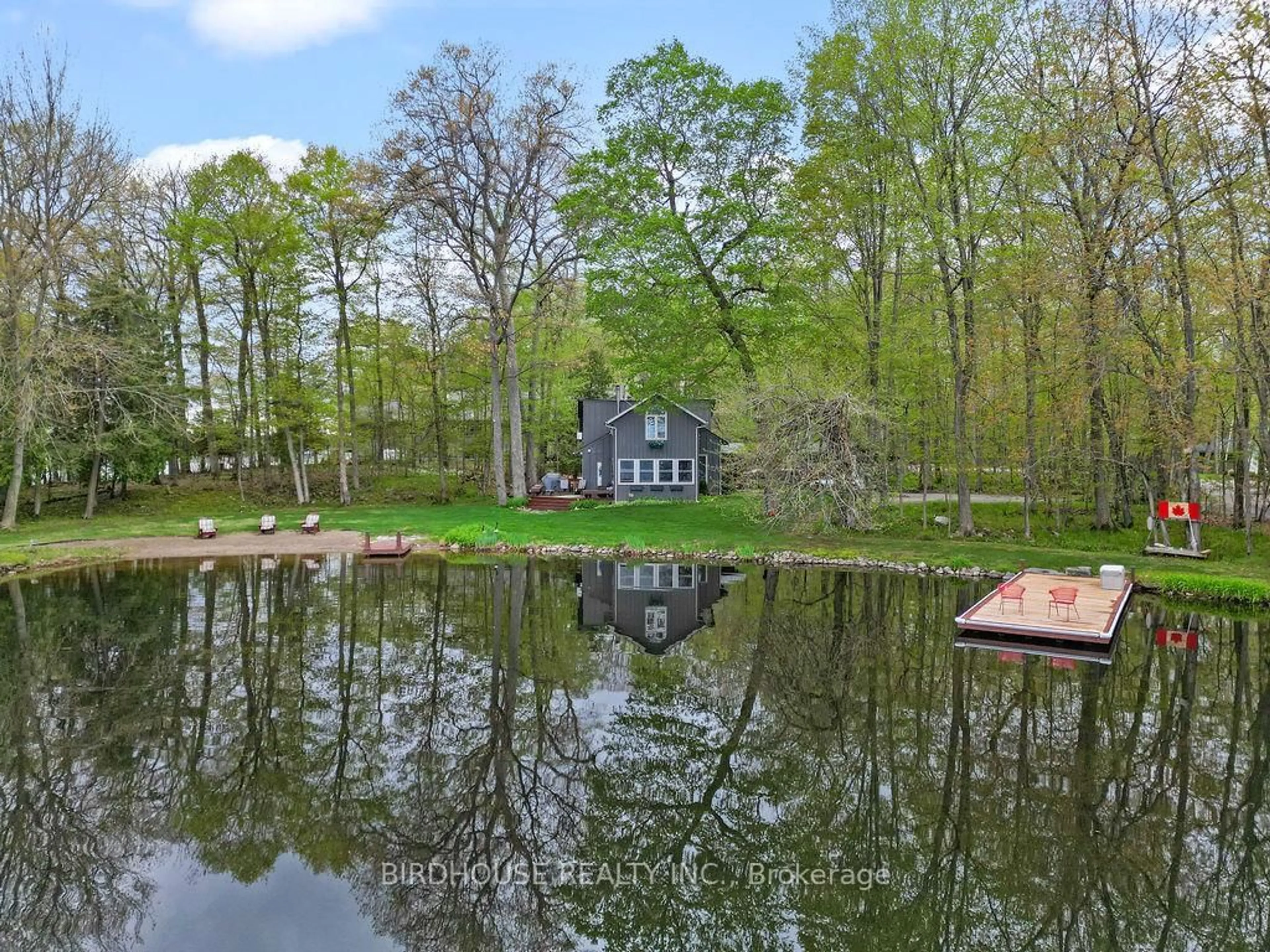 A pic from outside/outdoor area/front of a property/back of a property/a pic from drone, water/lake/river/ocean view for 68 Fire Route 103B N/A, Trent Lakes Ontario K0M 1A0