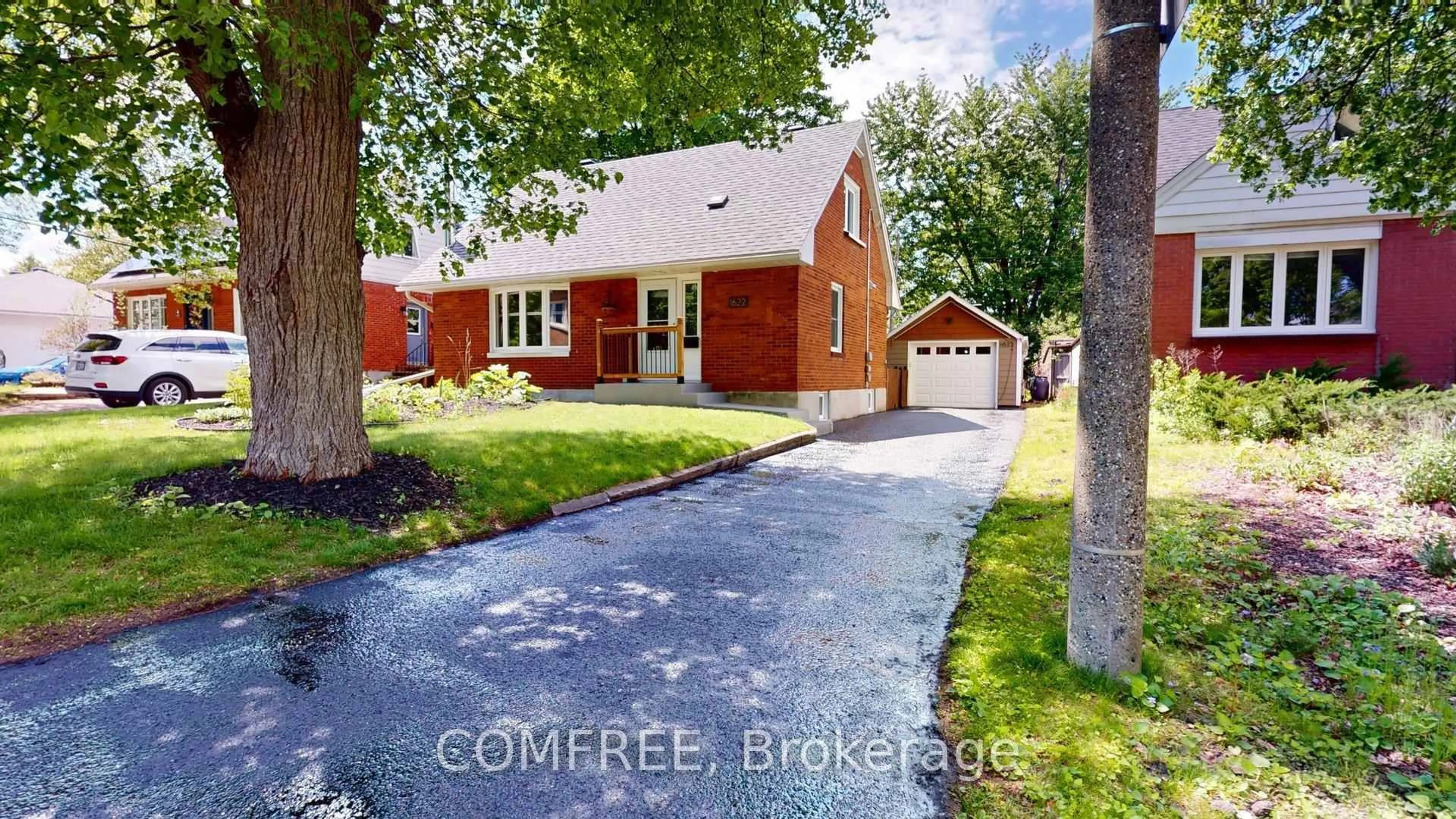 Home with brick exterior material, street for 1622 Drake Ave, Ottawa Ontario K1G 0L8