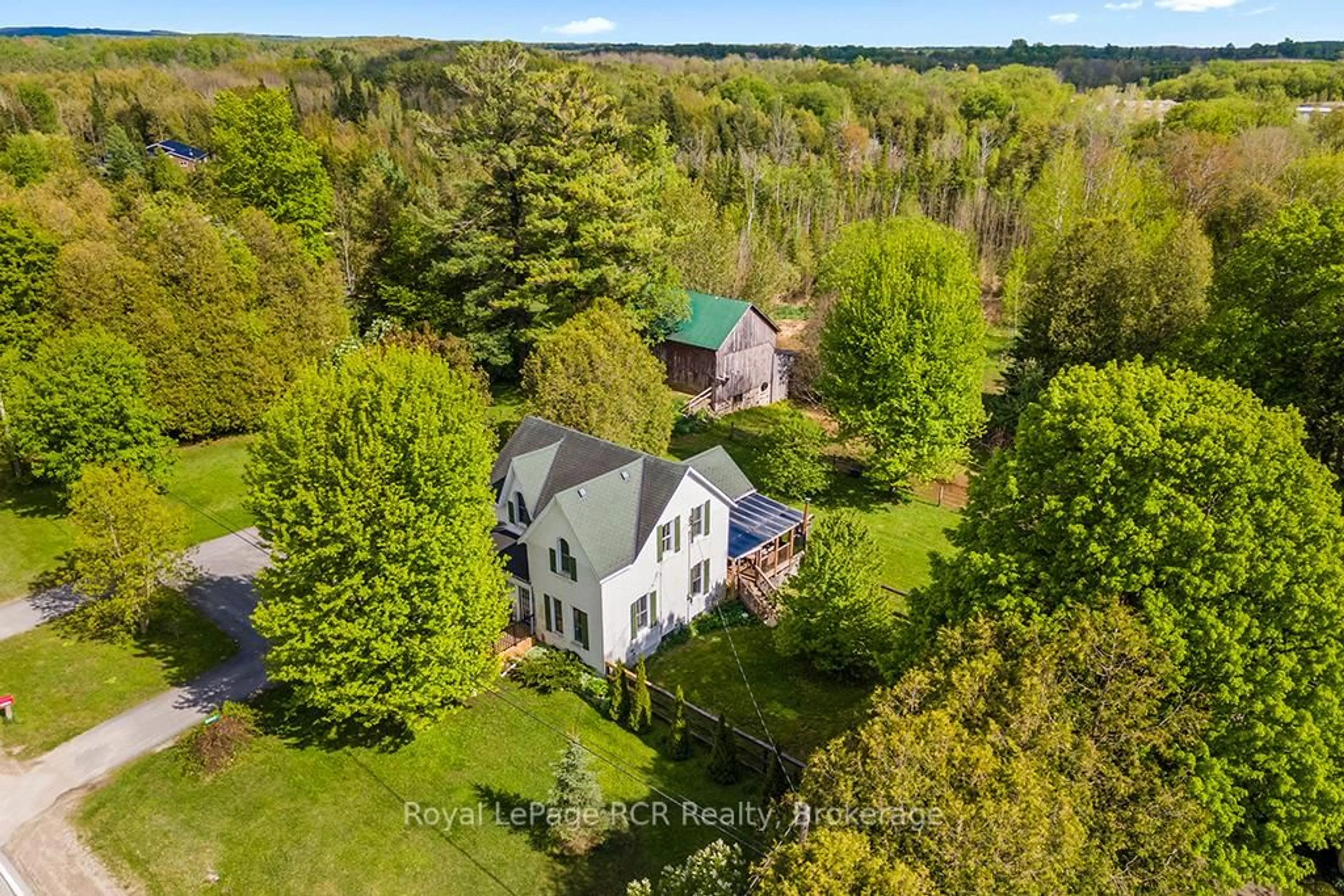 A pic from outside/outdoor area/front of a property/back of a property/a pic from drone, unknown for 403192 Grey Road 4 Rd, West Grey Ontario N0G 1R0
